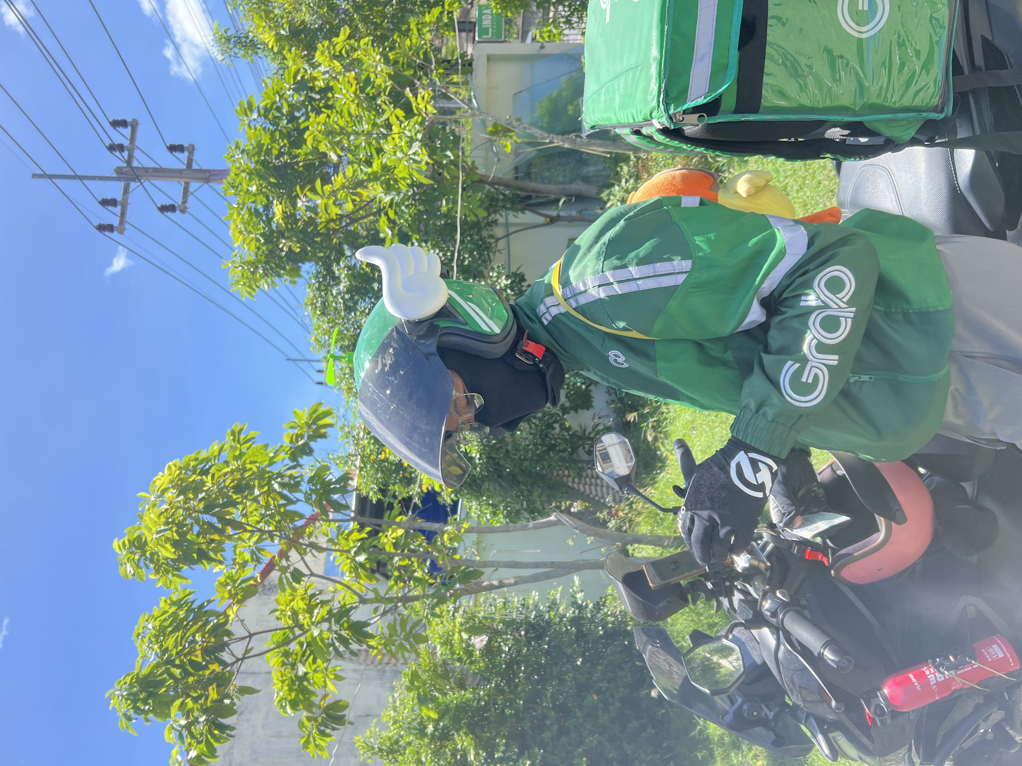 Grab driver spotted with decorated helmet in Ko Samui
