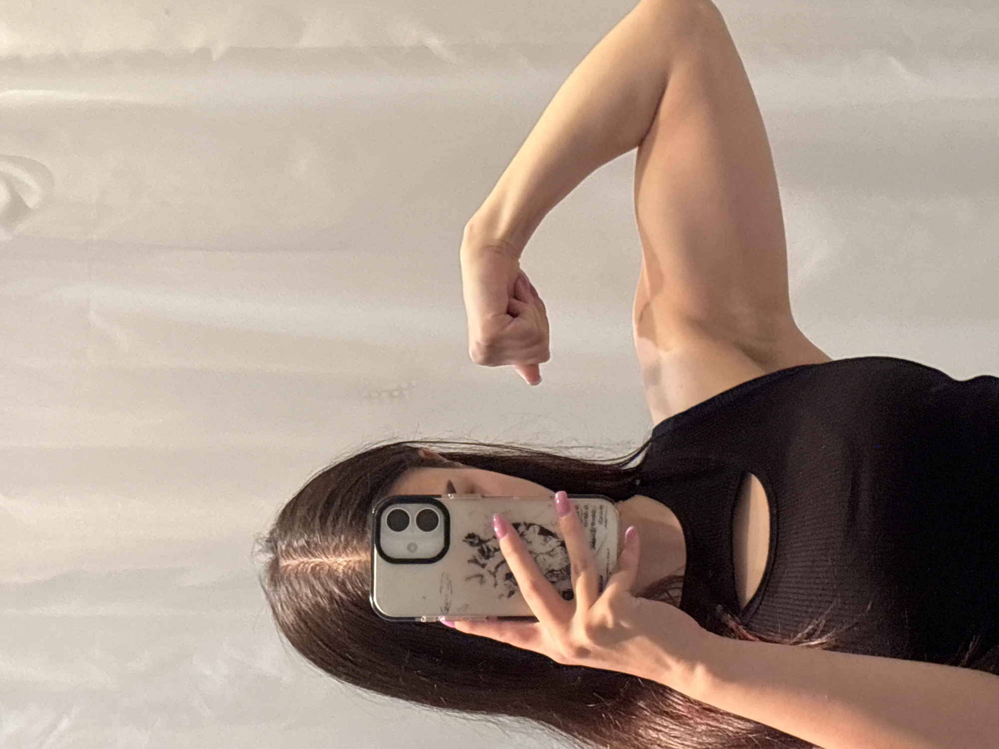 Person Takes Flexing Mirror Selfie in Polena, Bulgaria