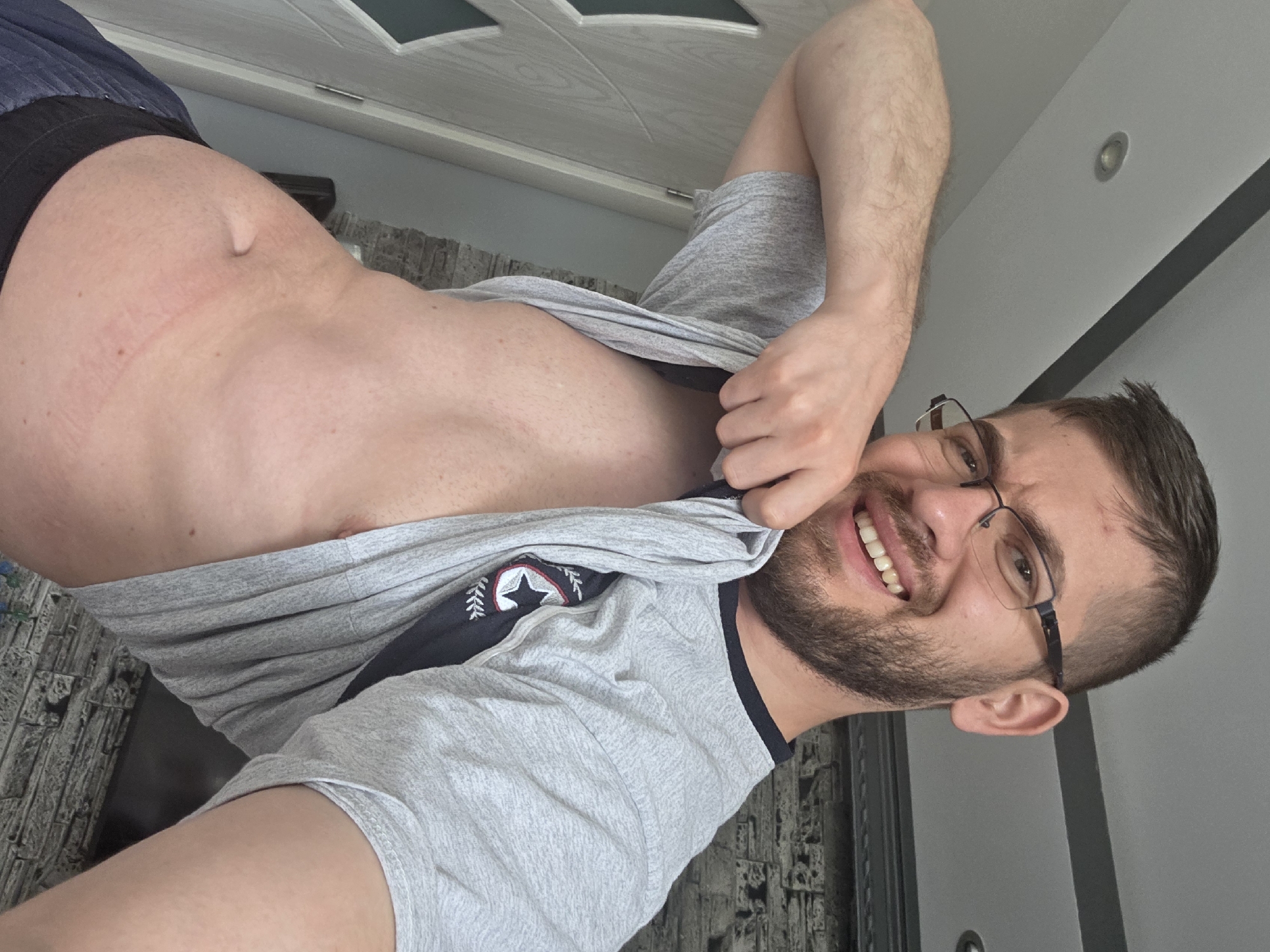 Man displays emblemed t-shirt in Bulgarian village