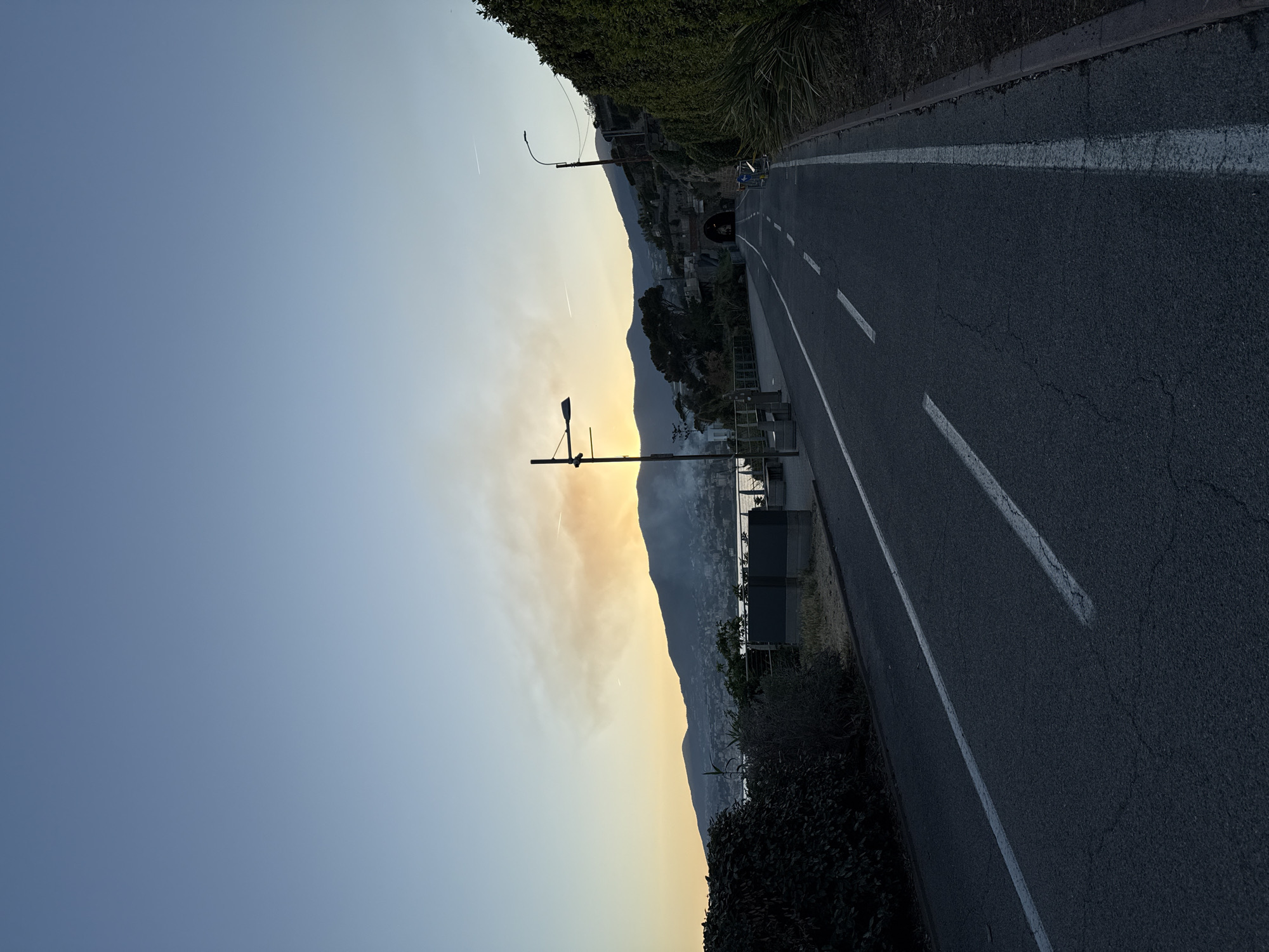 Golden hour coastal road views captured in Sanremo
