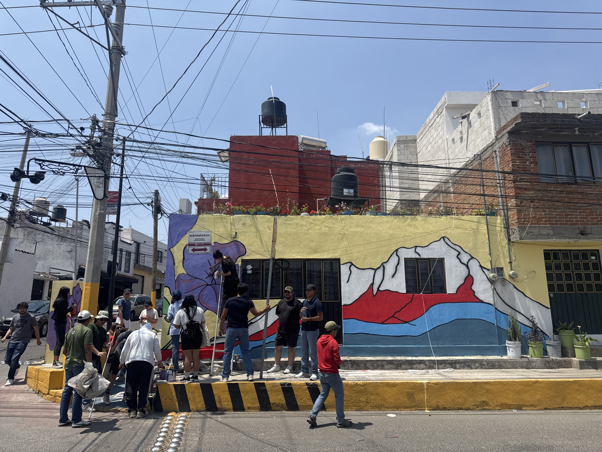 Colorful mural spotted on sunny Puebla street