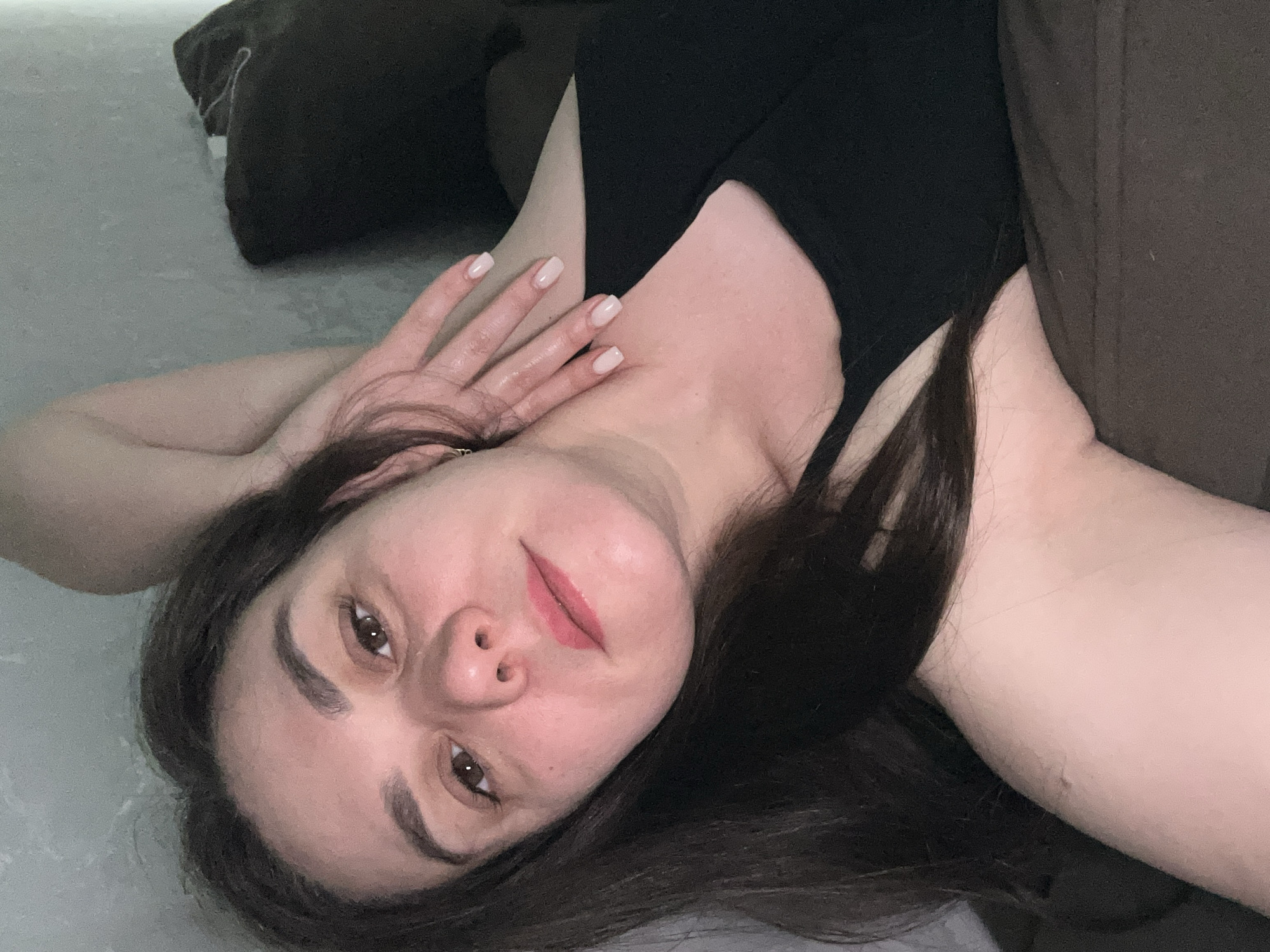 Woman resting indoors captured in Chaikovsky, Russia