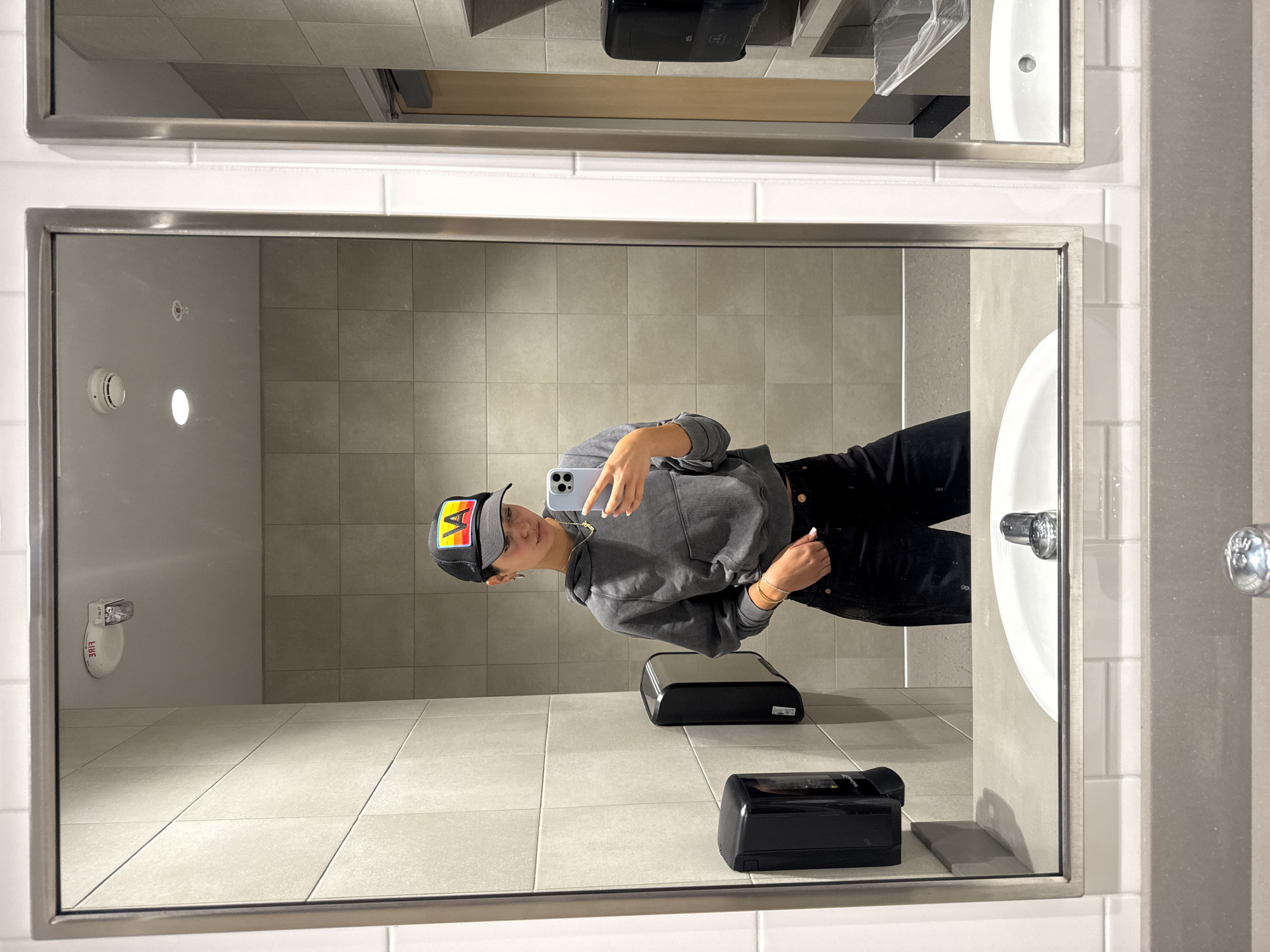 Mirror selfie taken in Los Angeles bathroom