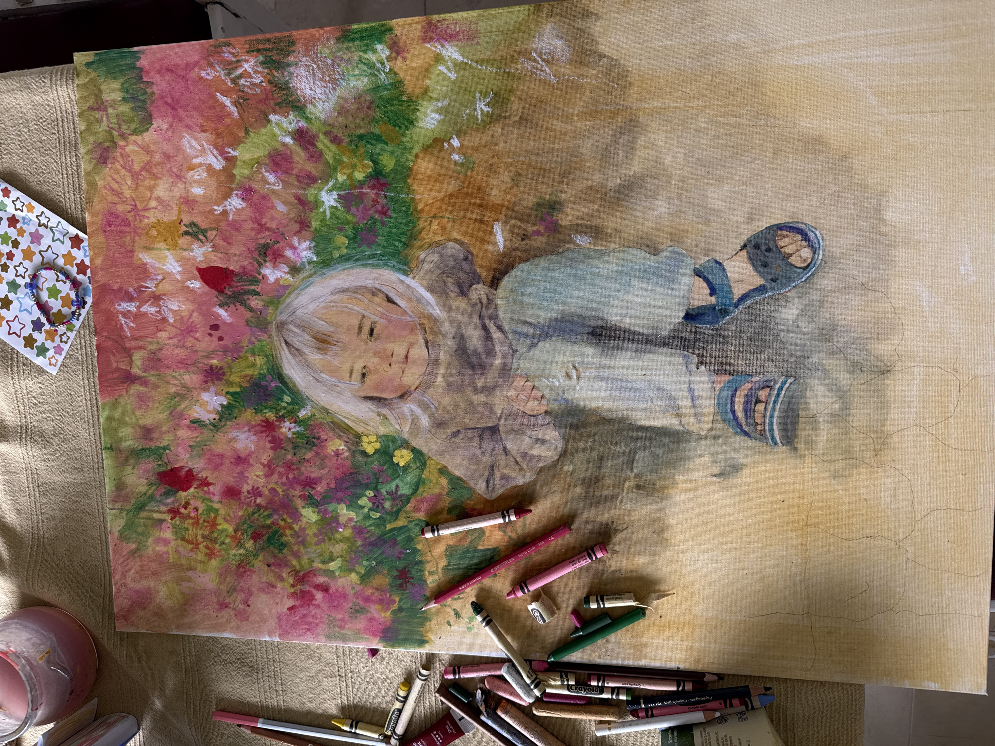 Artist captures child portrait painting in progress in Kfar Vradim