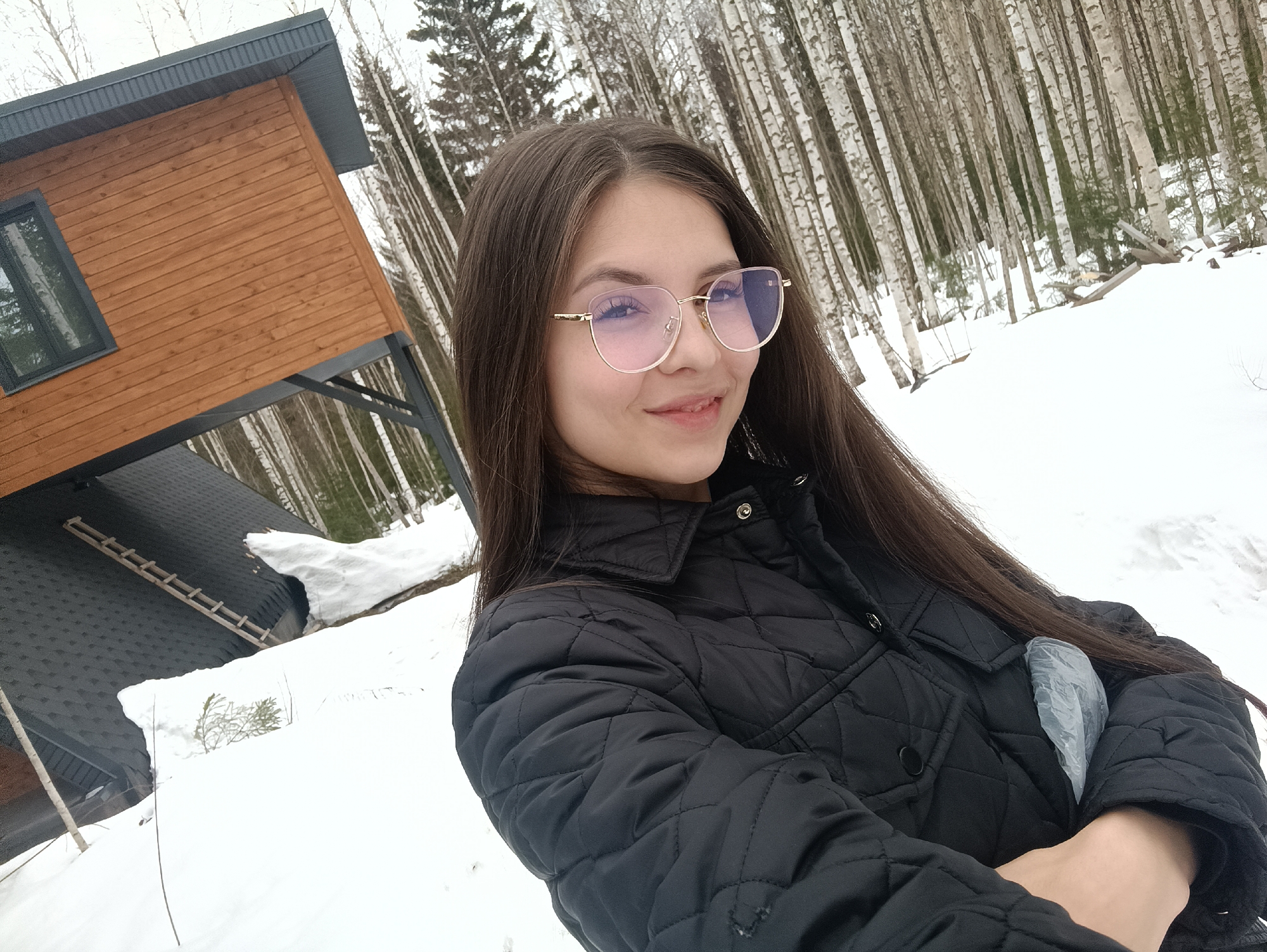Woman in snowy forest, indoor rest scene documented