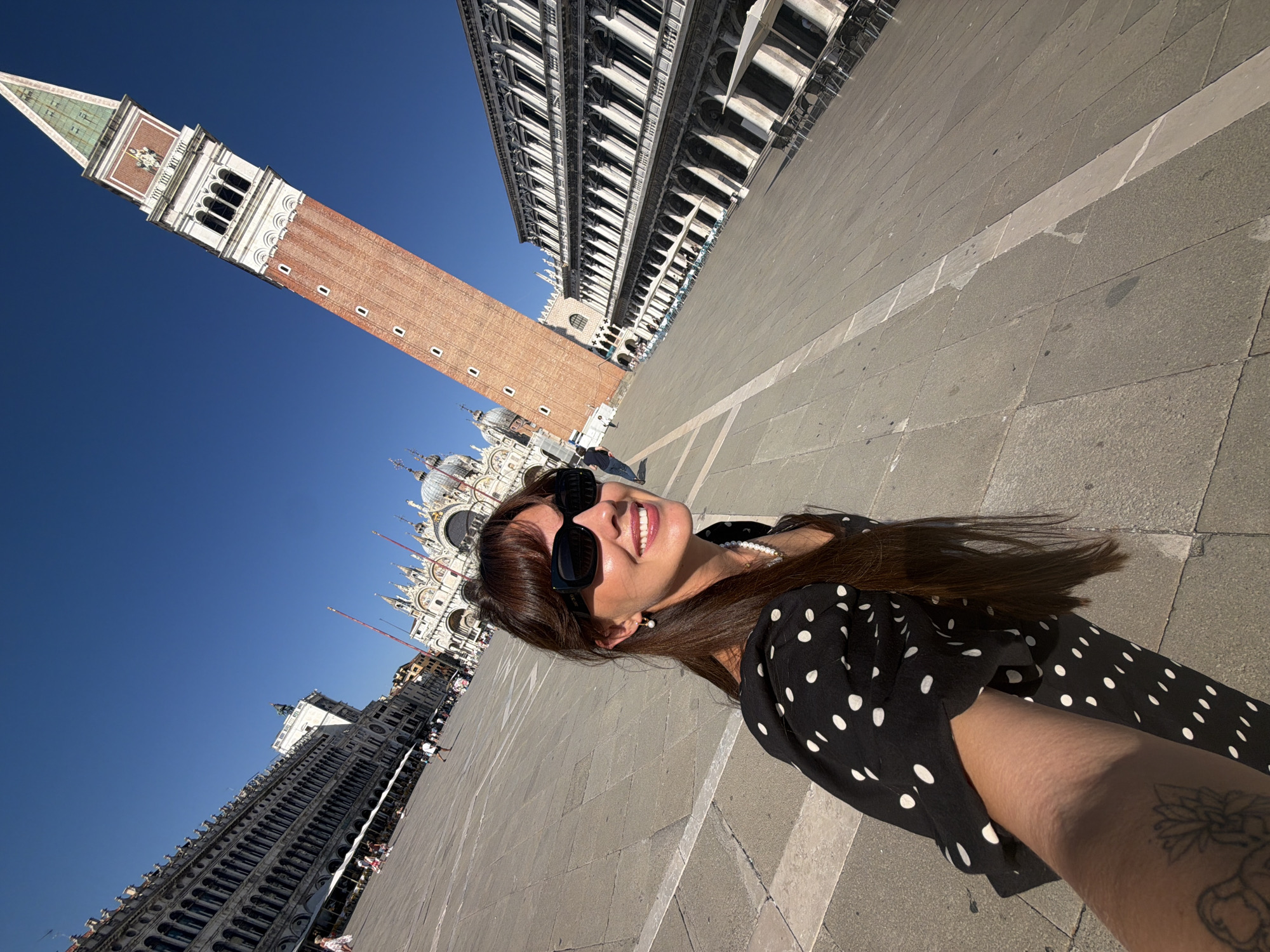 Selfies and live jazz on a sunny afternoon in St. Mark's Square