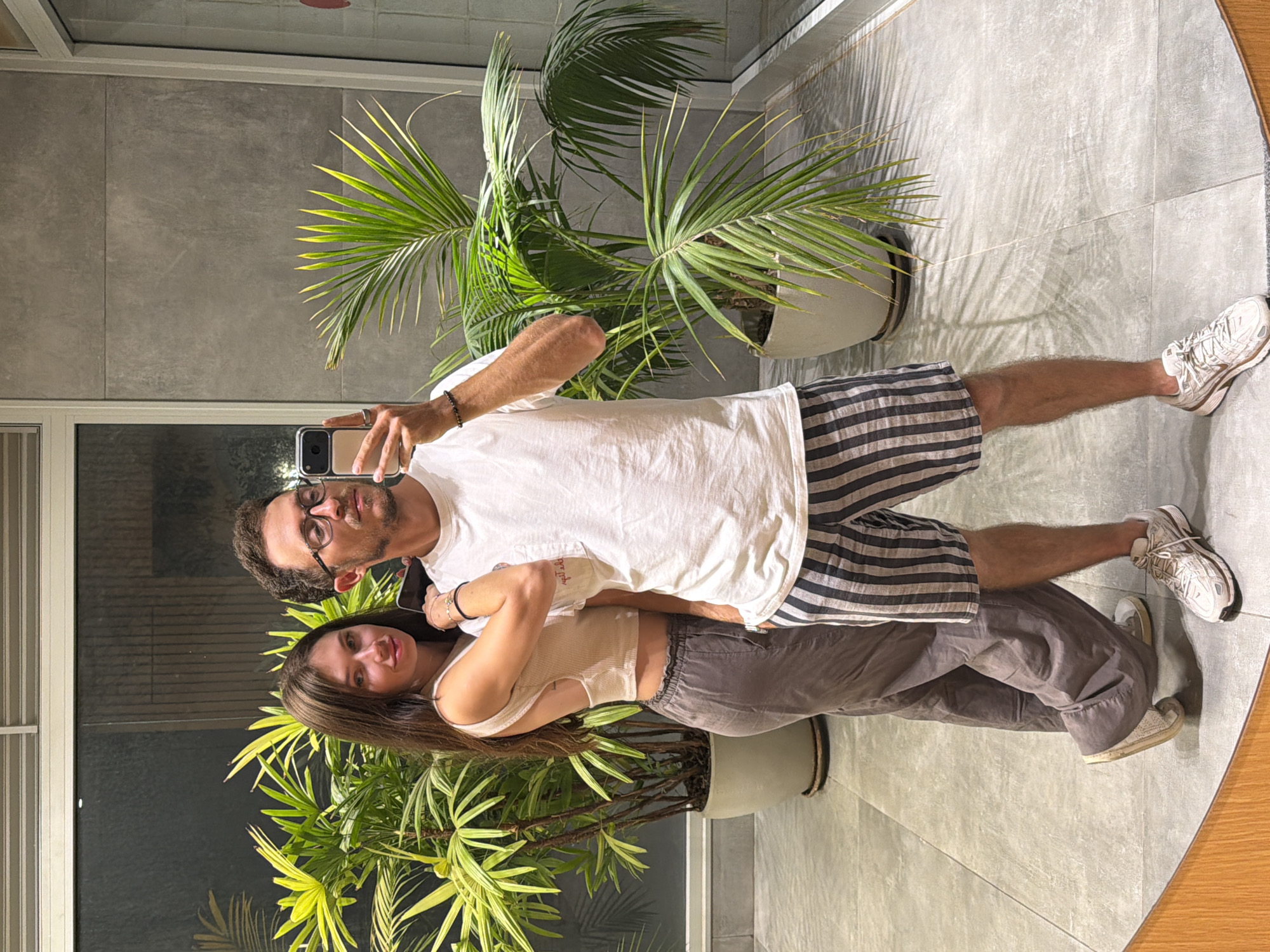 Mirror selfie with two people posing in Herzliya