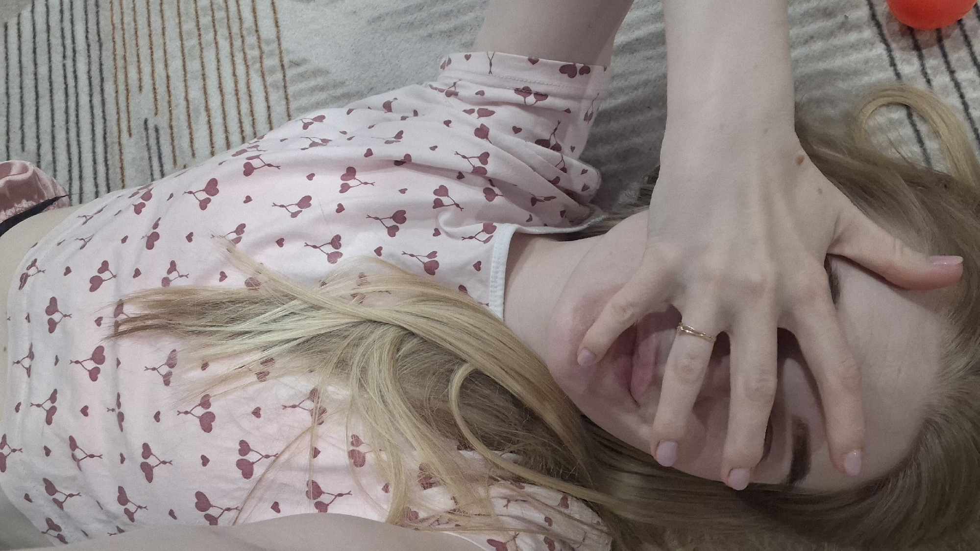 Woman Takes Playful Selfie Series With Candy in Russian City