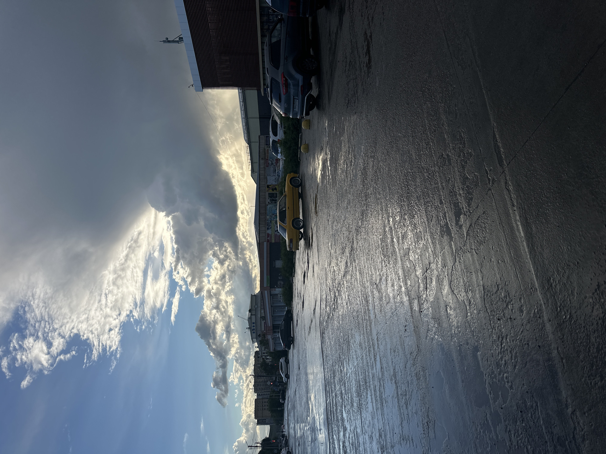 Rain-slicked street scene in Kokshetau, Kazakhstan
