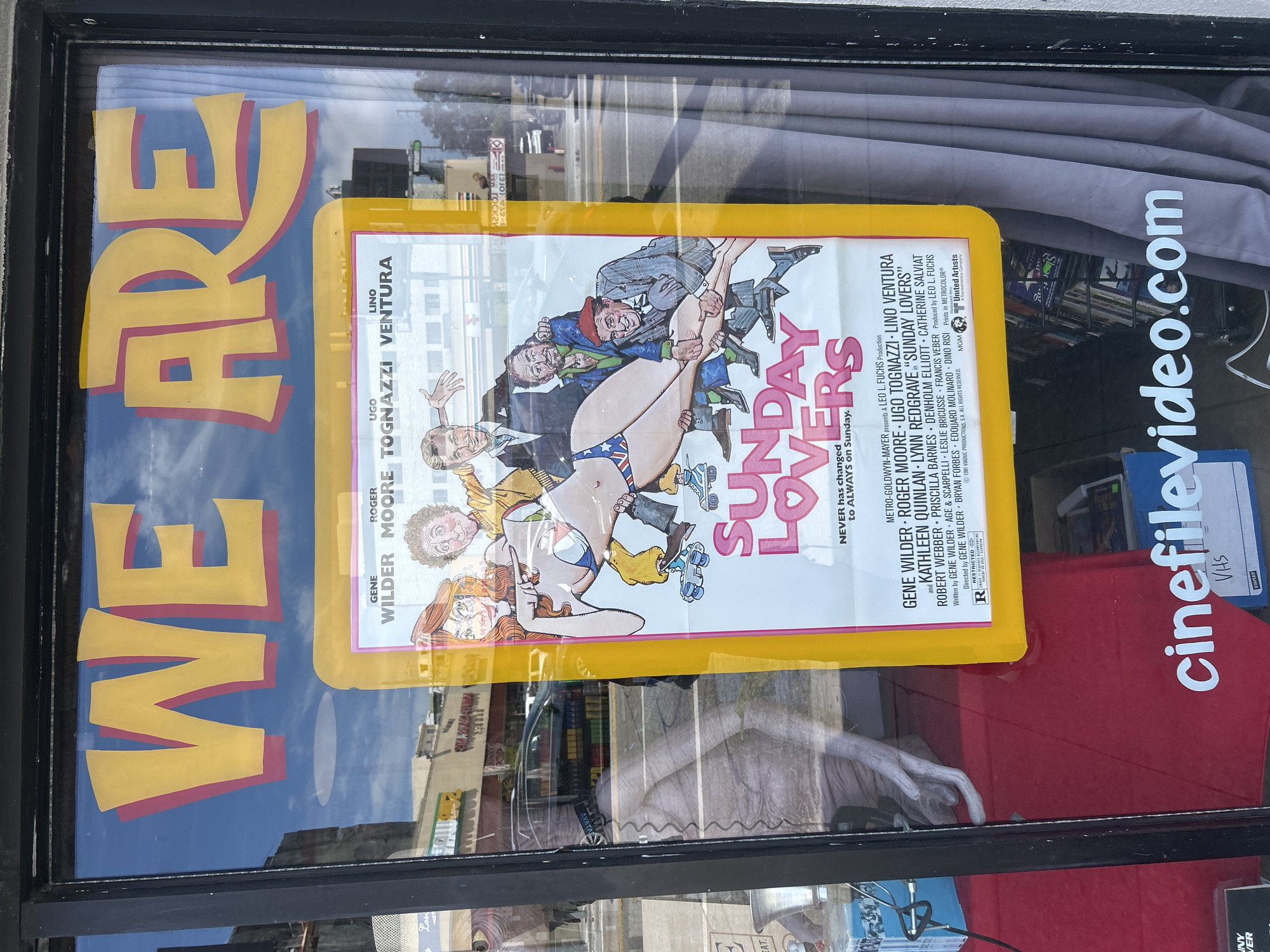 Vintage movie poster displayed at LA video store window