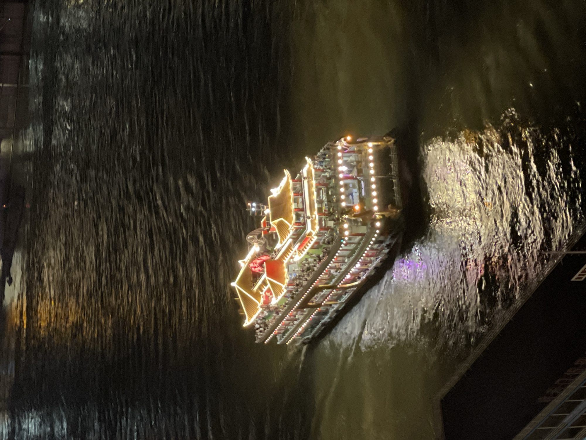 Chongqing's Yuzhong District at night — river boats, bridges, skyline