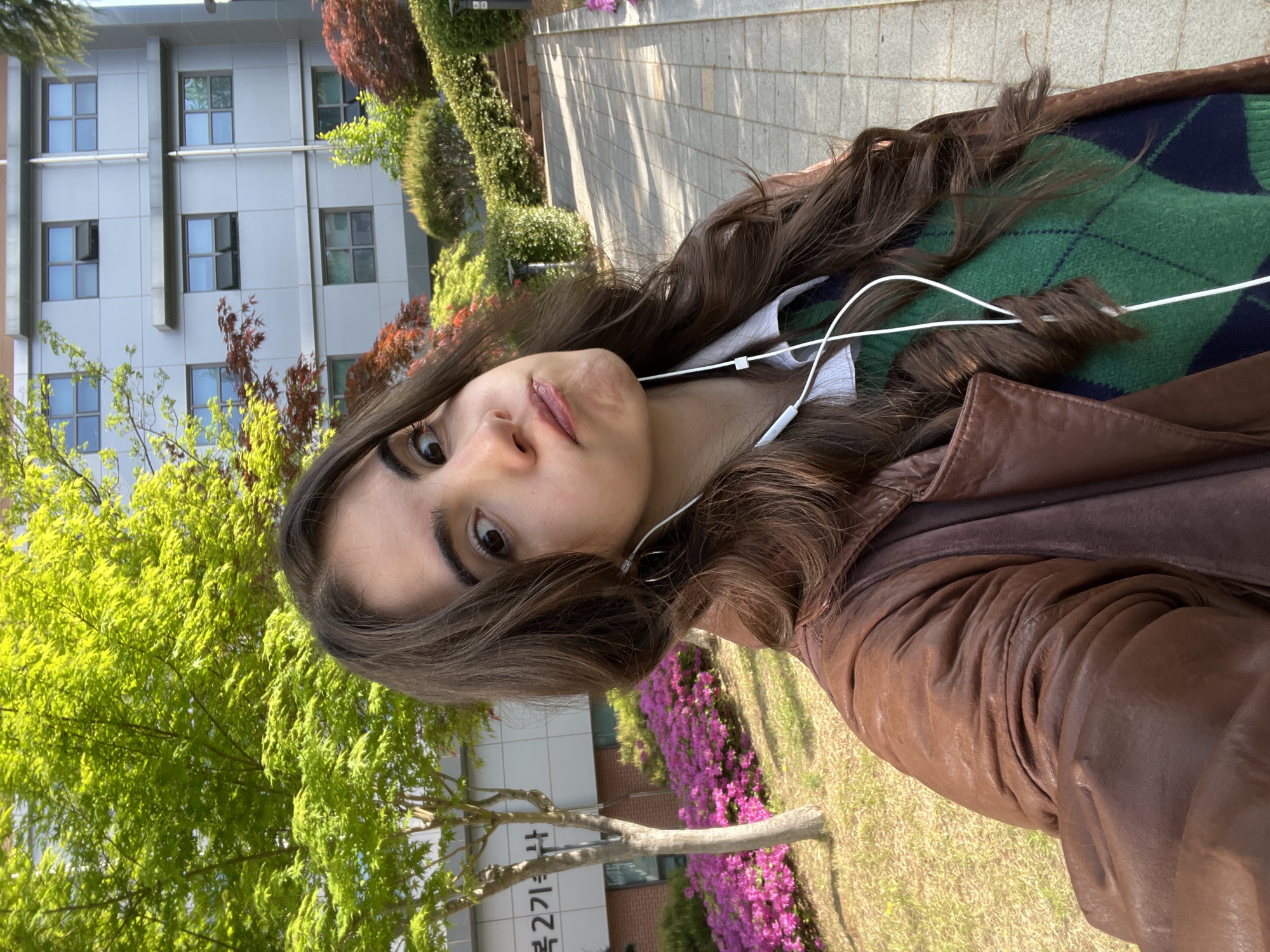 Young person in leather jacket spotted outdoors in Daegu