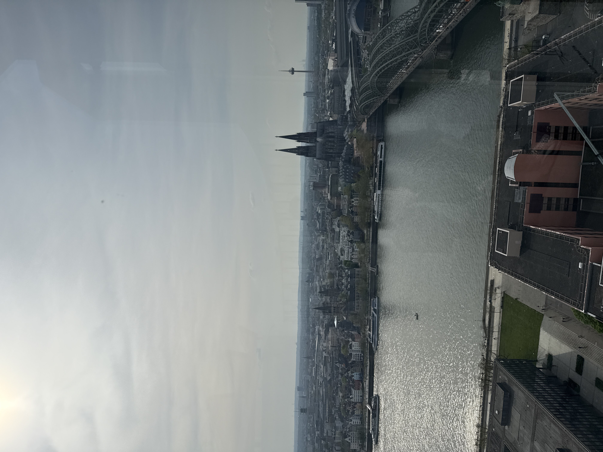 Aerial views document Cologne cityscape from elevated position