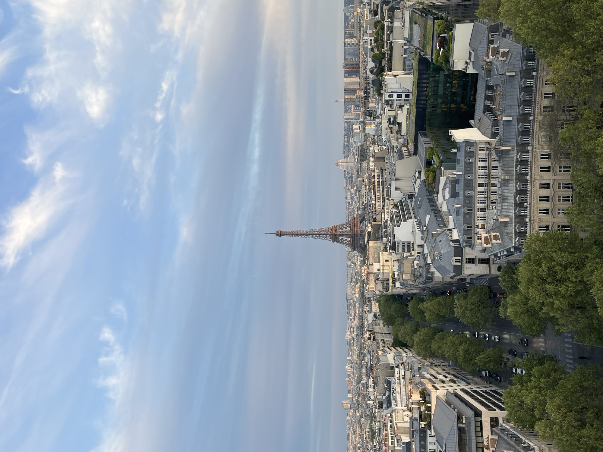 Panoramic Paris cityscape captured featuring prominent Eiffel Tower view