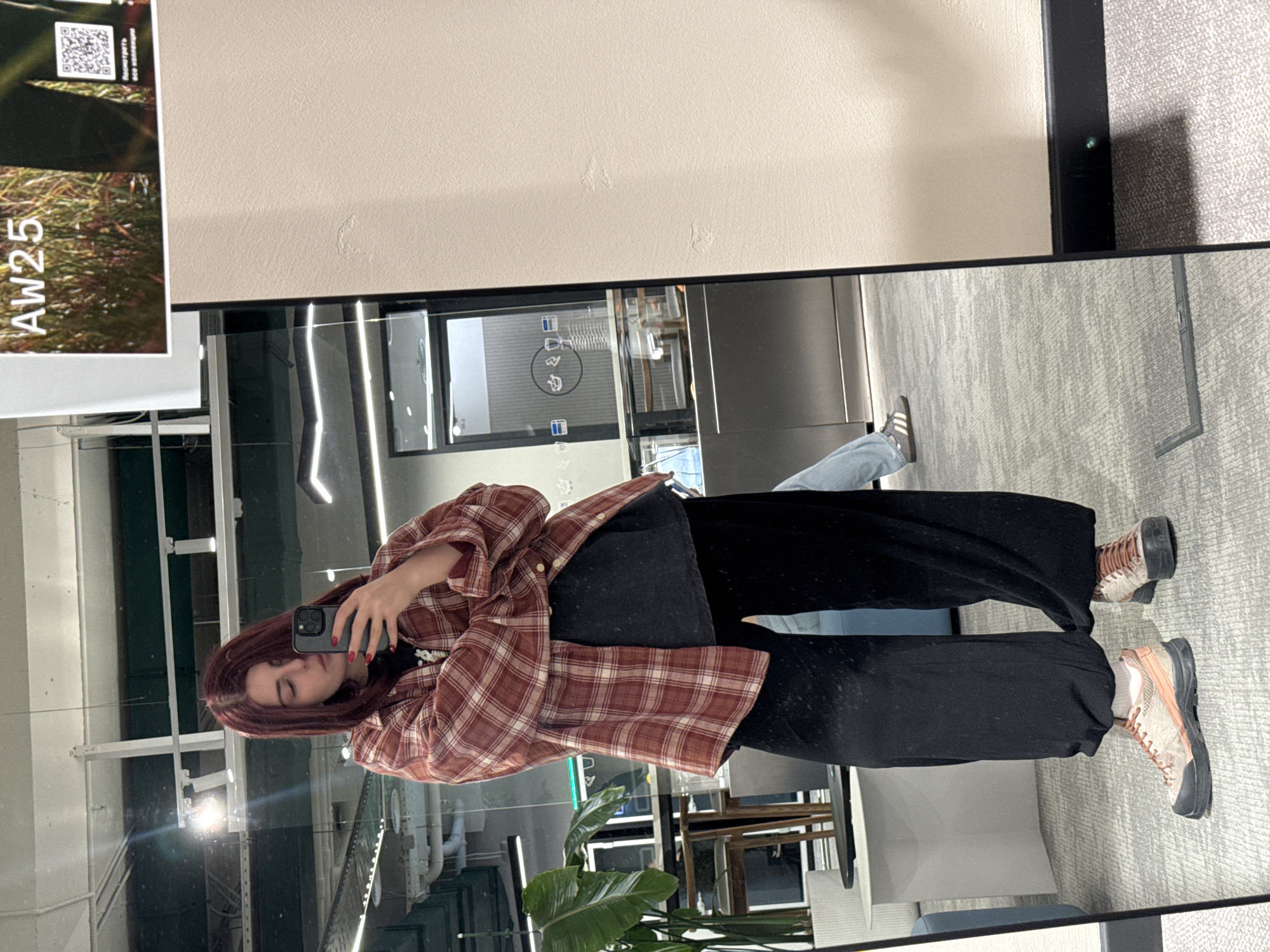 Woman takes office mirror selfie in Khimki