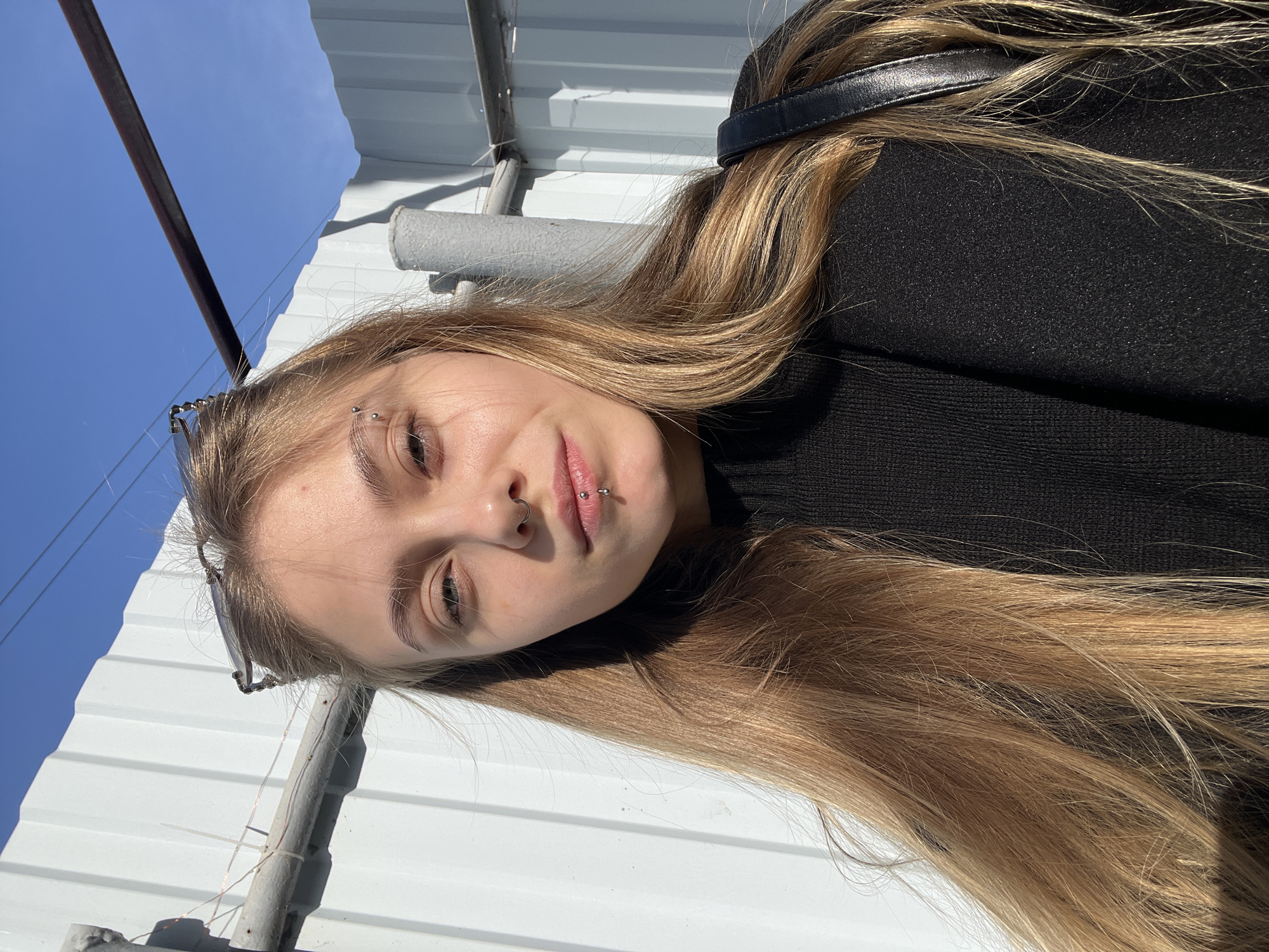 Woman photographed outdoors in sunlight in Foki, Russia