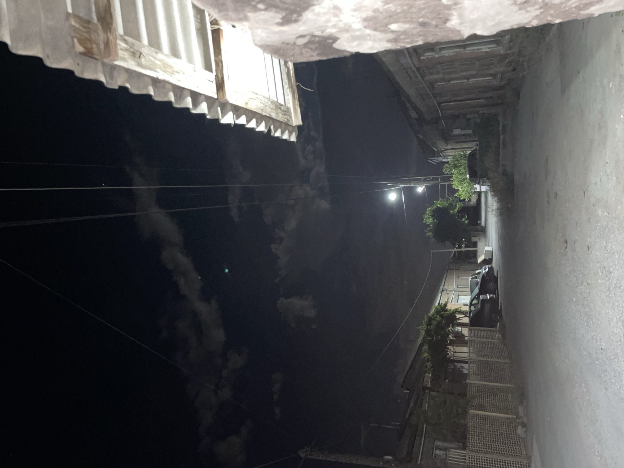 Nighttime look up at a corrugated metal roof in Armavir