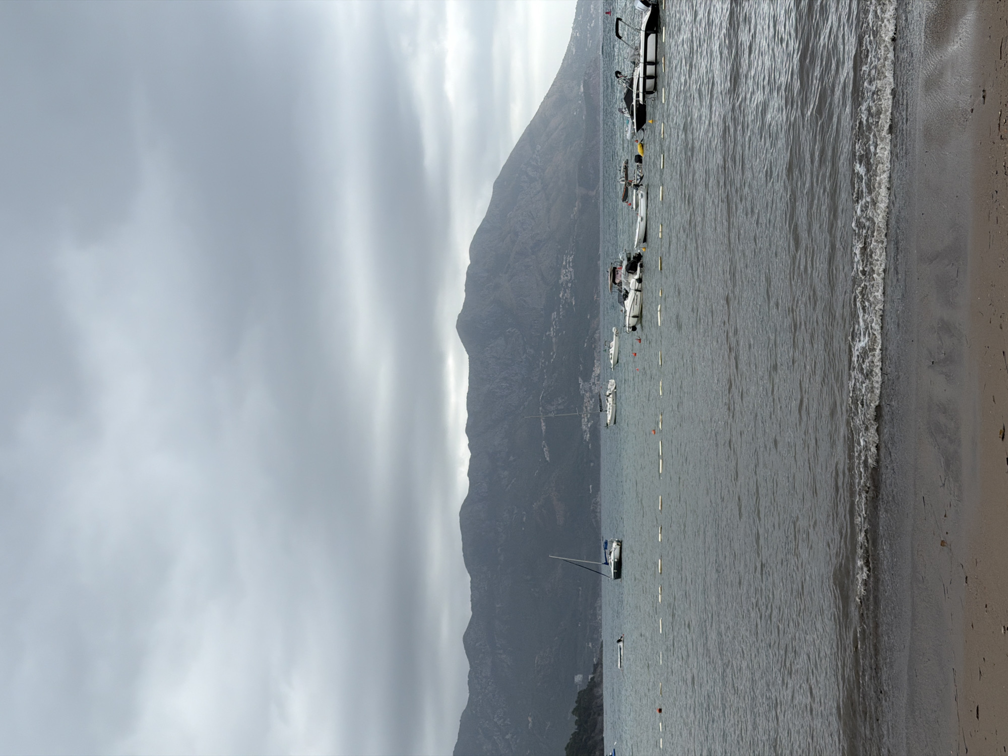 Cloudy morning at Budva's waterfront Ferris wheel