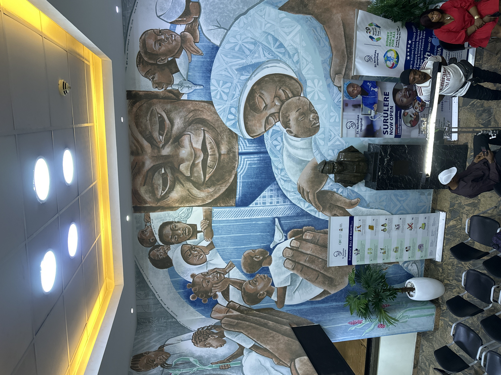 Lagos morning captures film crew, hospital lobby, public sculptures