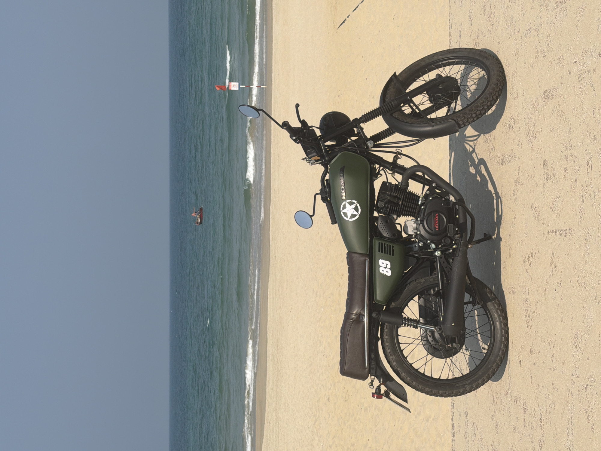 Vintage Honda motorcycle spotted on Đà Nẵng beach