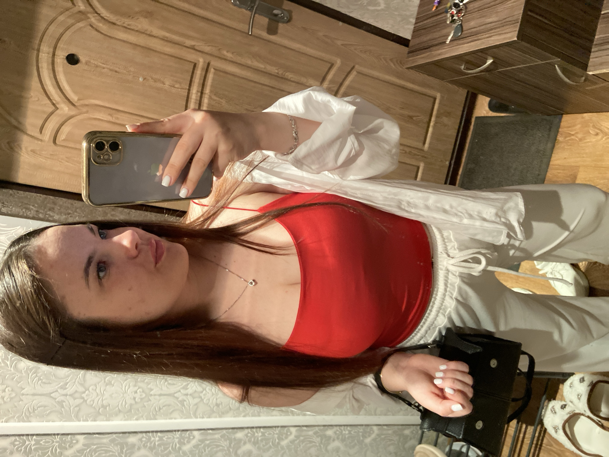 Mirror selfies and a drowsy Scottish Fold cat at home in Poltava