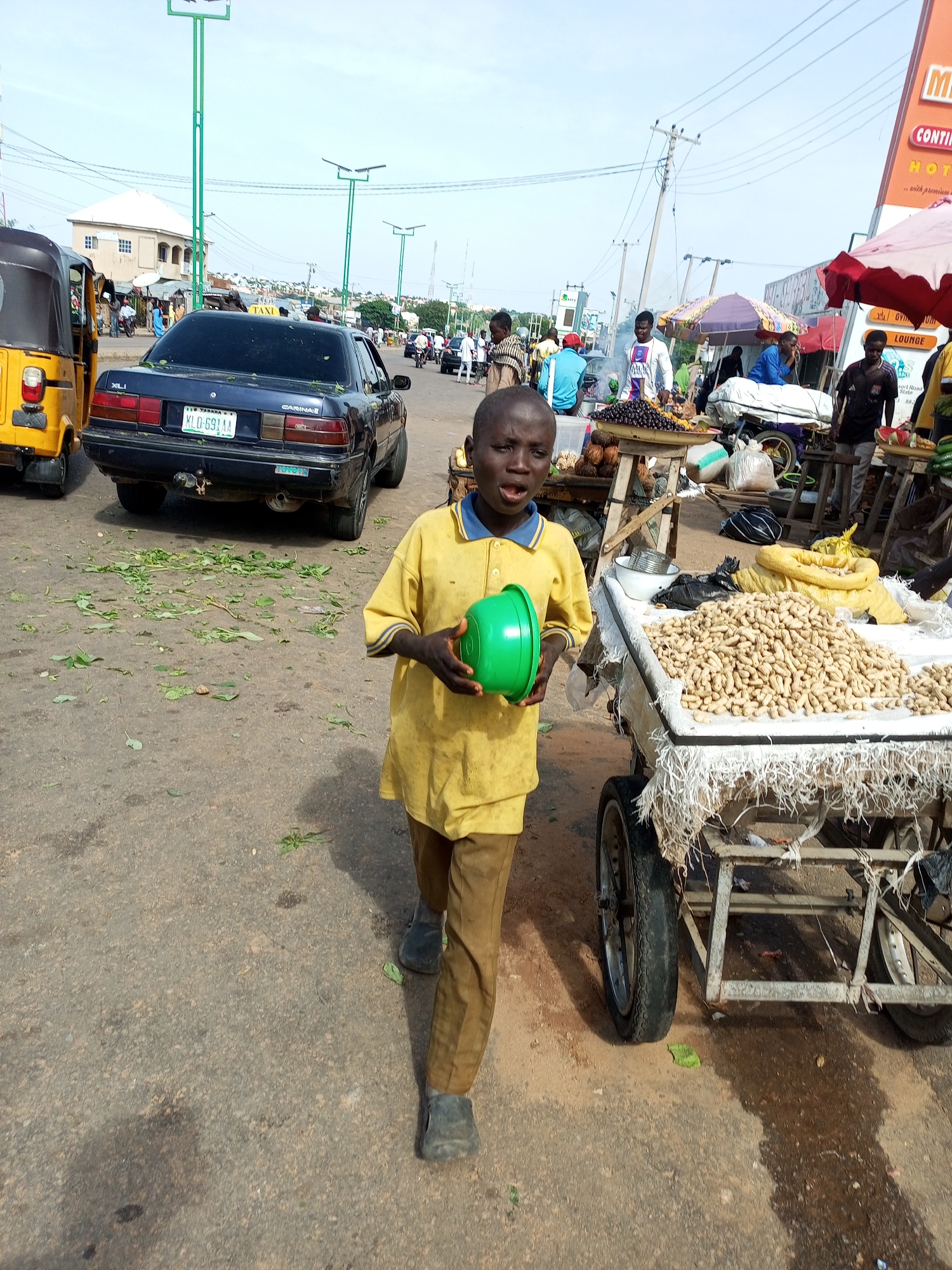 Morning street life and market activity in Tempure-Tumfure, Nigeria