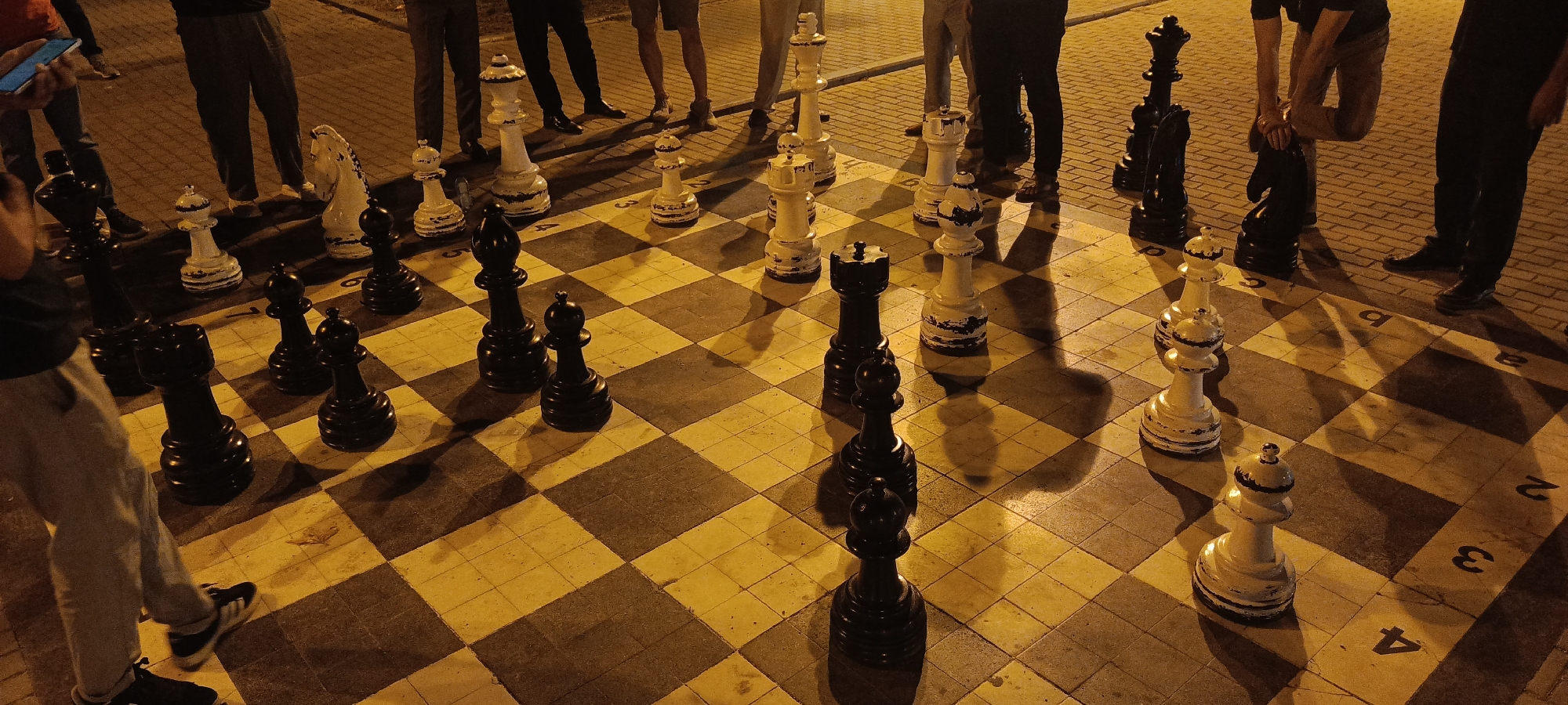 Giant chess and neon-lit cactus in a Baku night spot