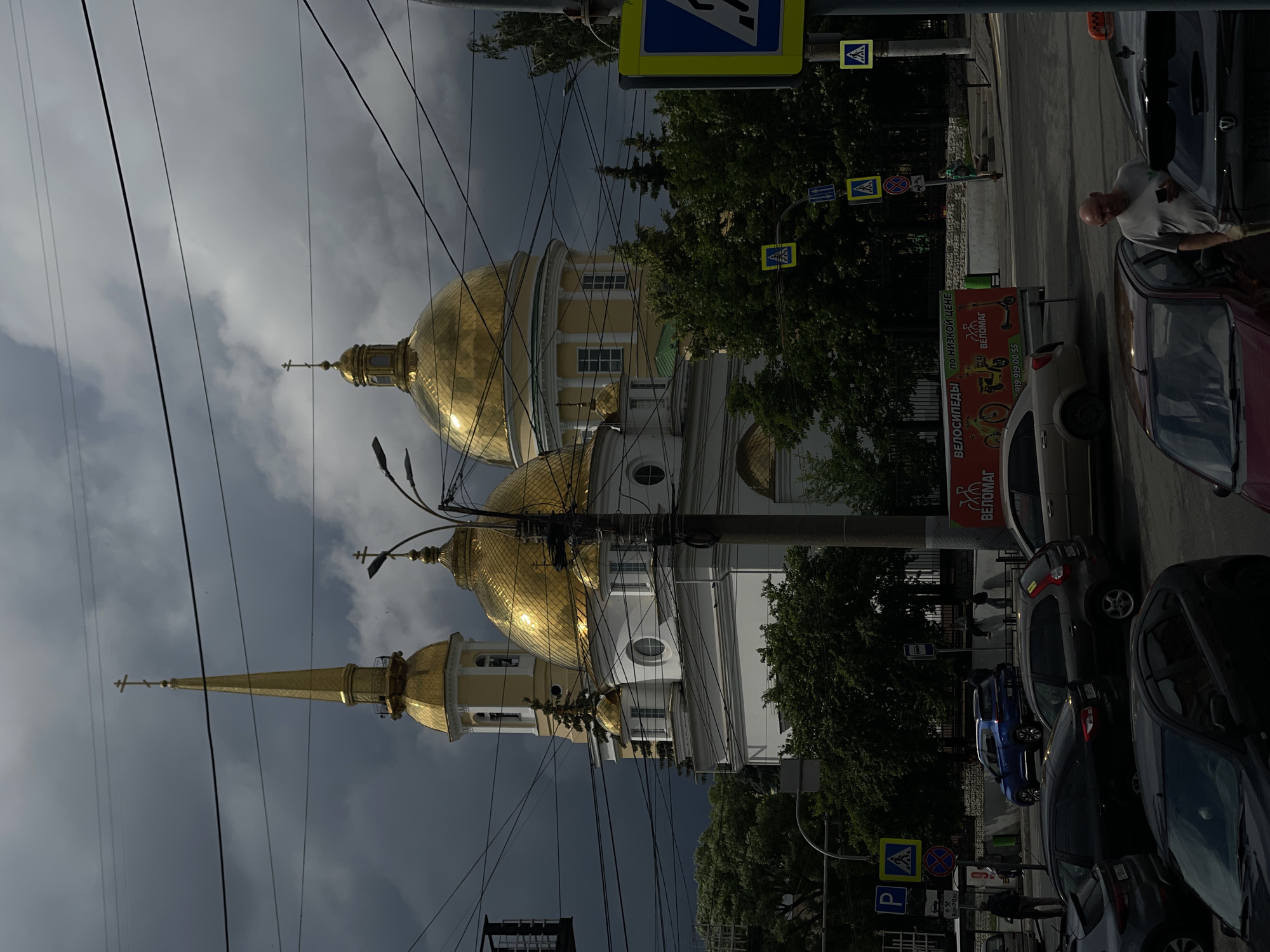 Inside a Russian bakery, golden domes visible outside