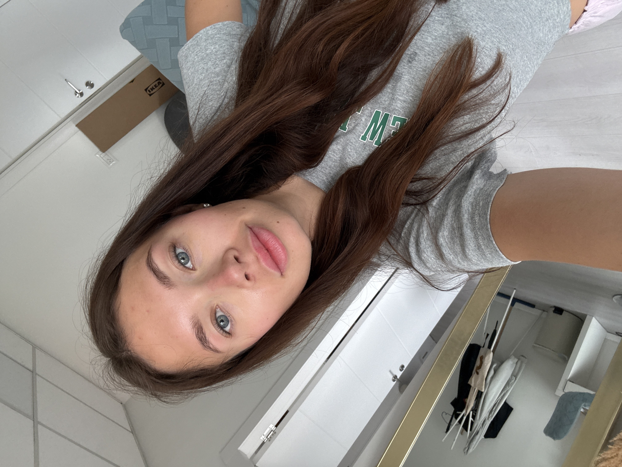 Woman takes morning selfie in Ramat Gan bathroom