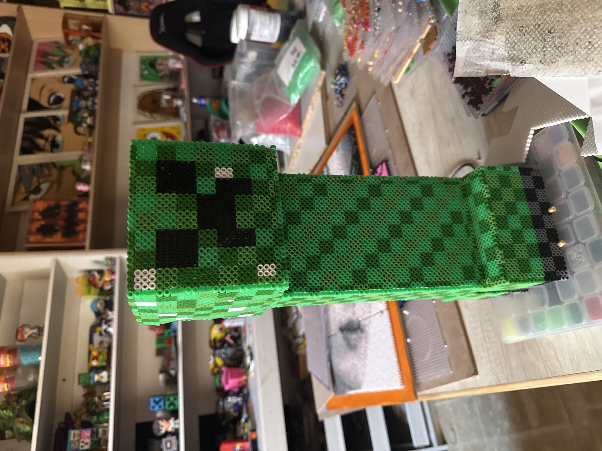 Handmade Minecraft Creeper craft displayed in Puebla