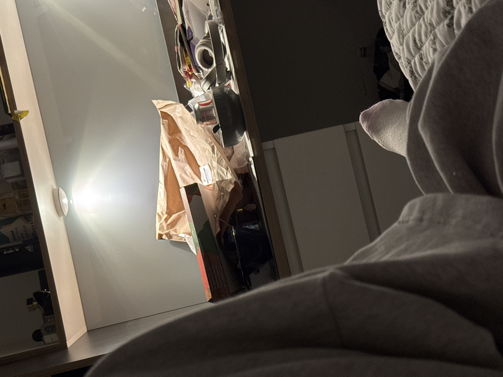 Person relaxing in bedroom captured in Hull late night