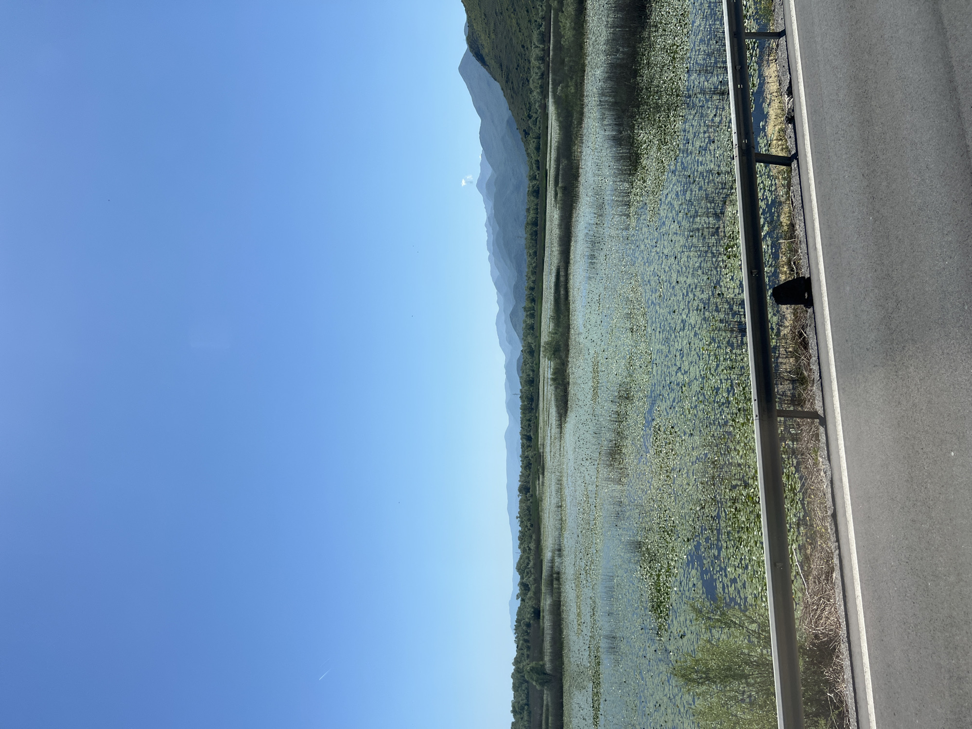 Train journey through Bistrice captures lake views, local architecture