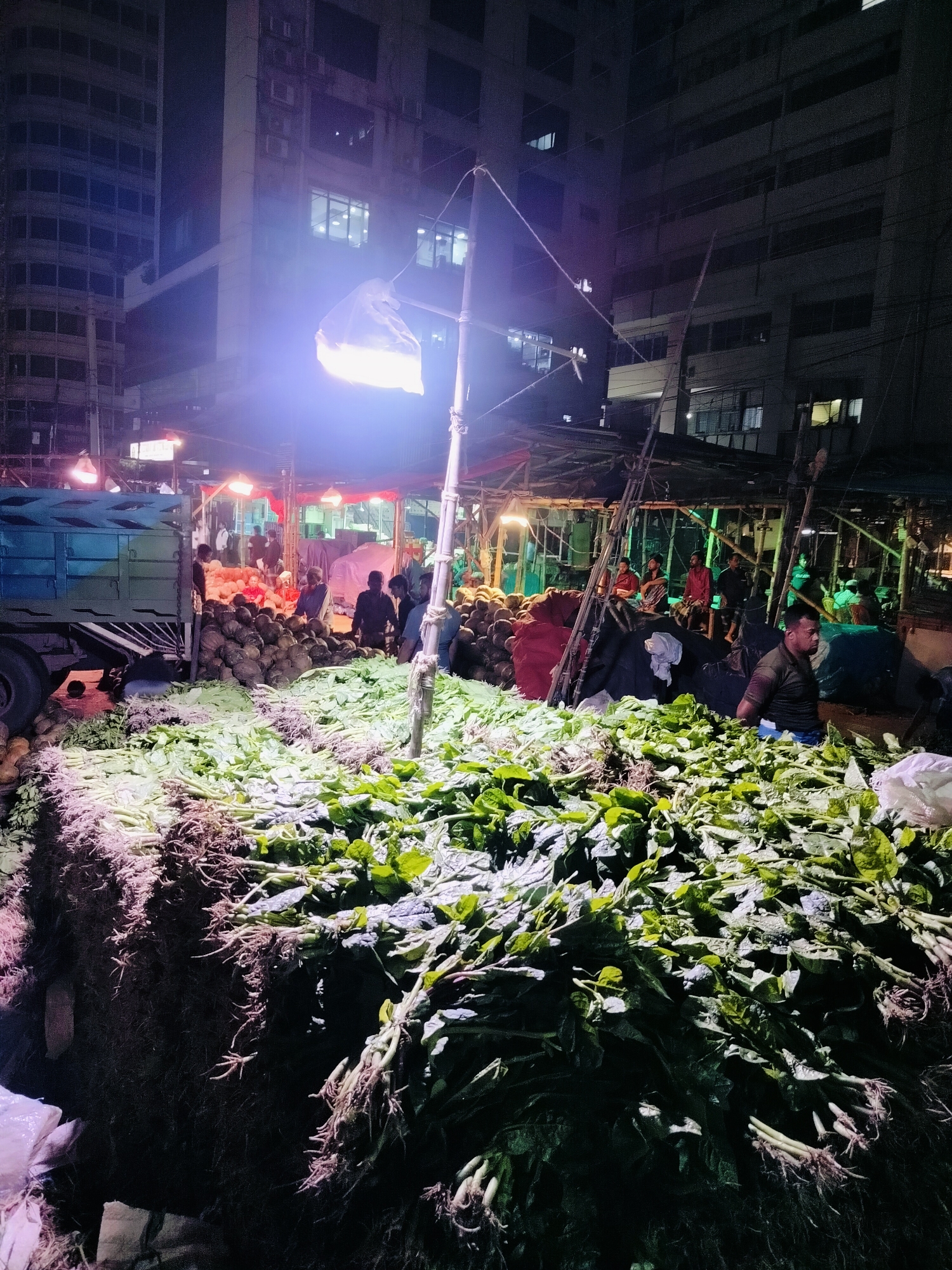 Dhaka's wholesale vegetable market buzzes through the night