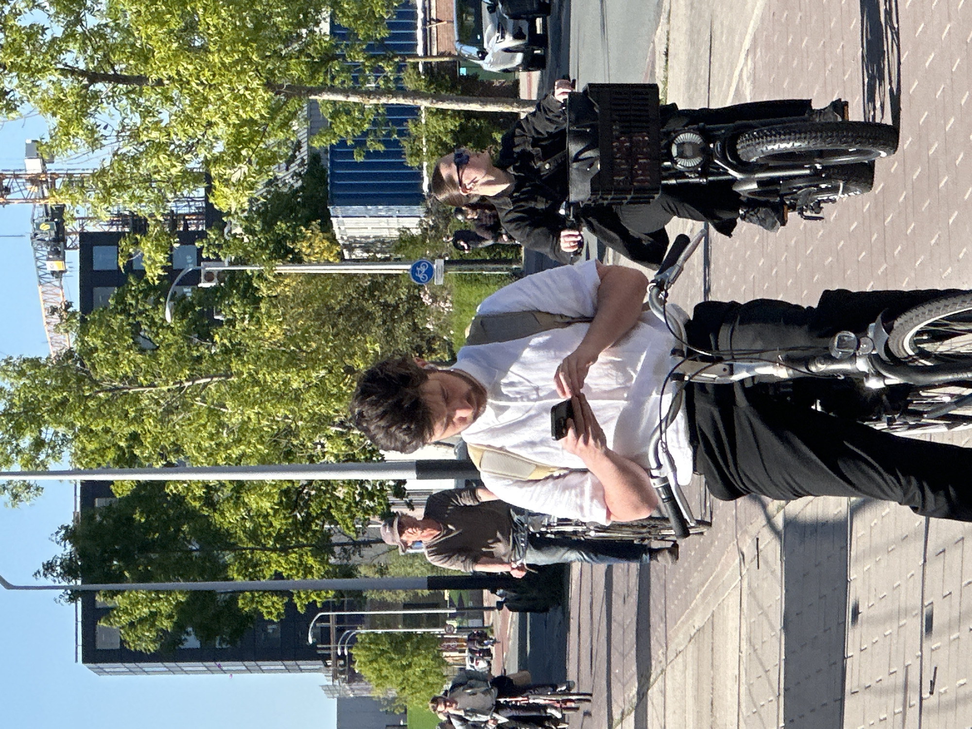 Amsterdam residents document ordinary Friday afternoon urban life