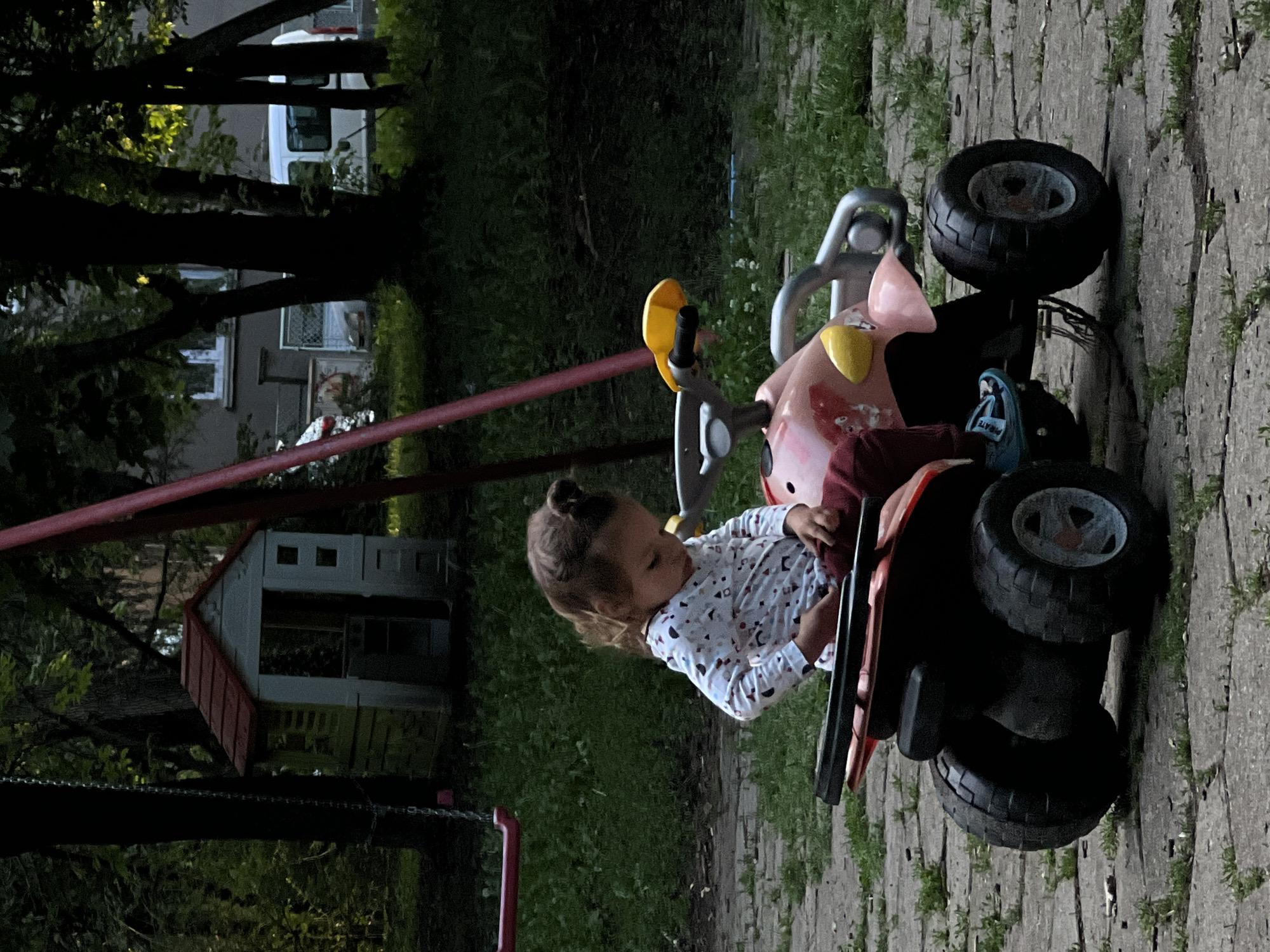 Child plays on toy vehicles in Sofia park