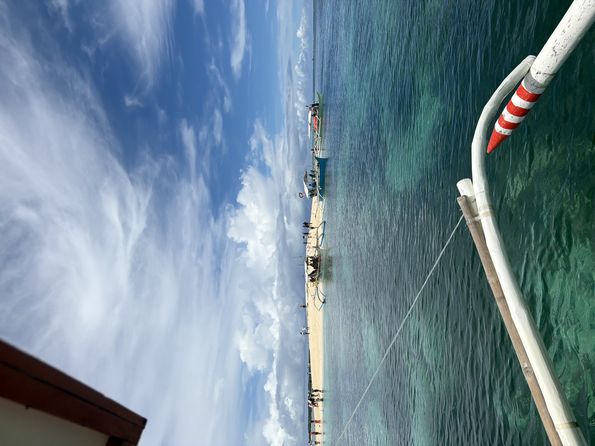 Early morning beach activities documented in Dapa, Philippines