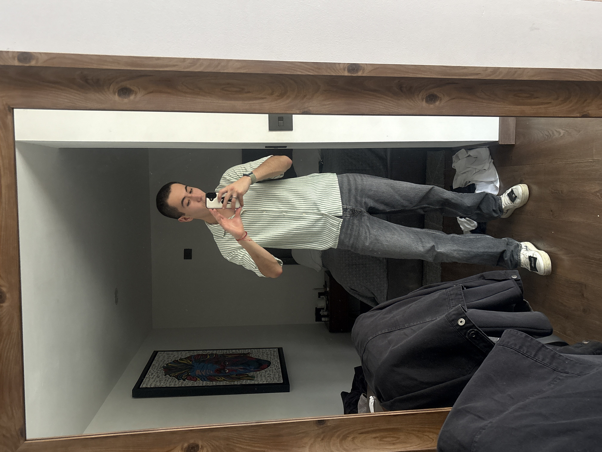 Person takes mirror selfie in San Bernardino Tlaxcalancingo