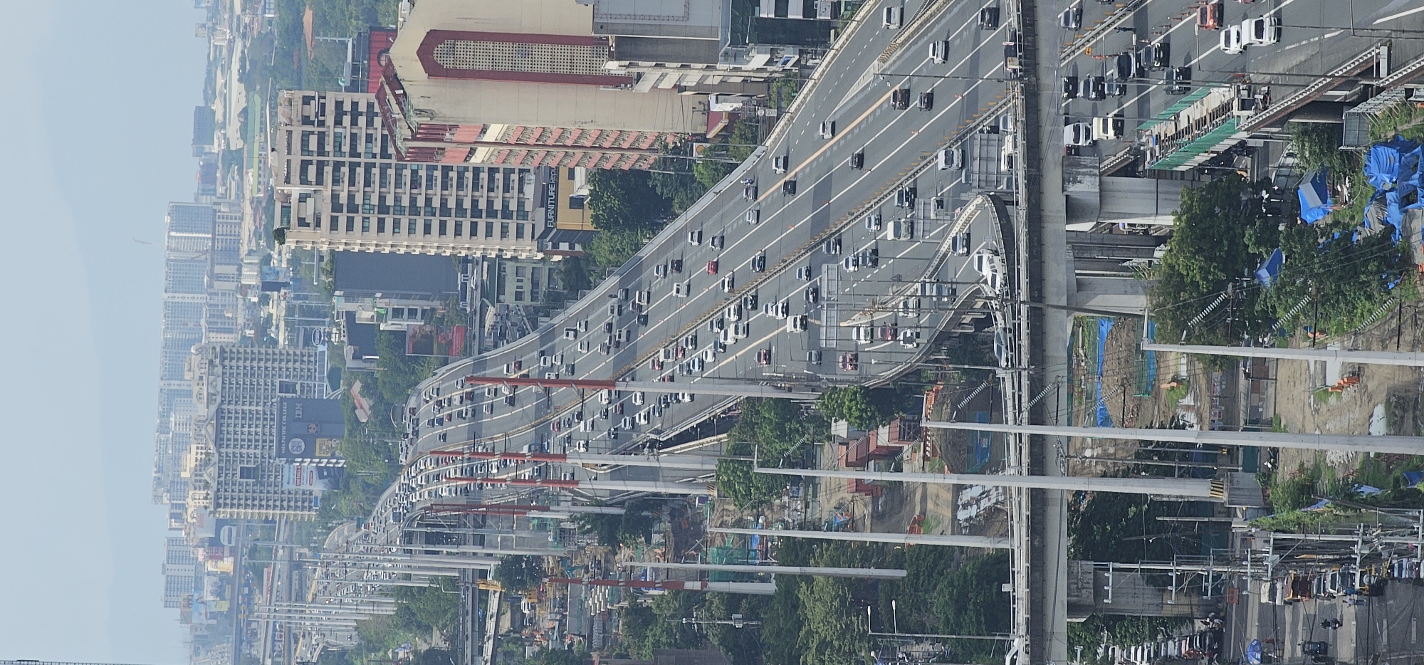 Makati streets and skyline, busy with morning traffic