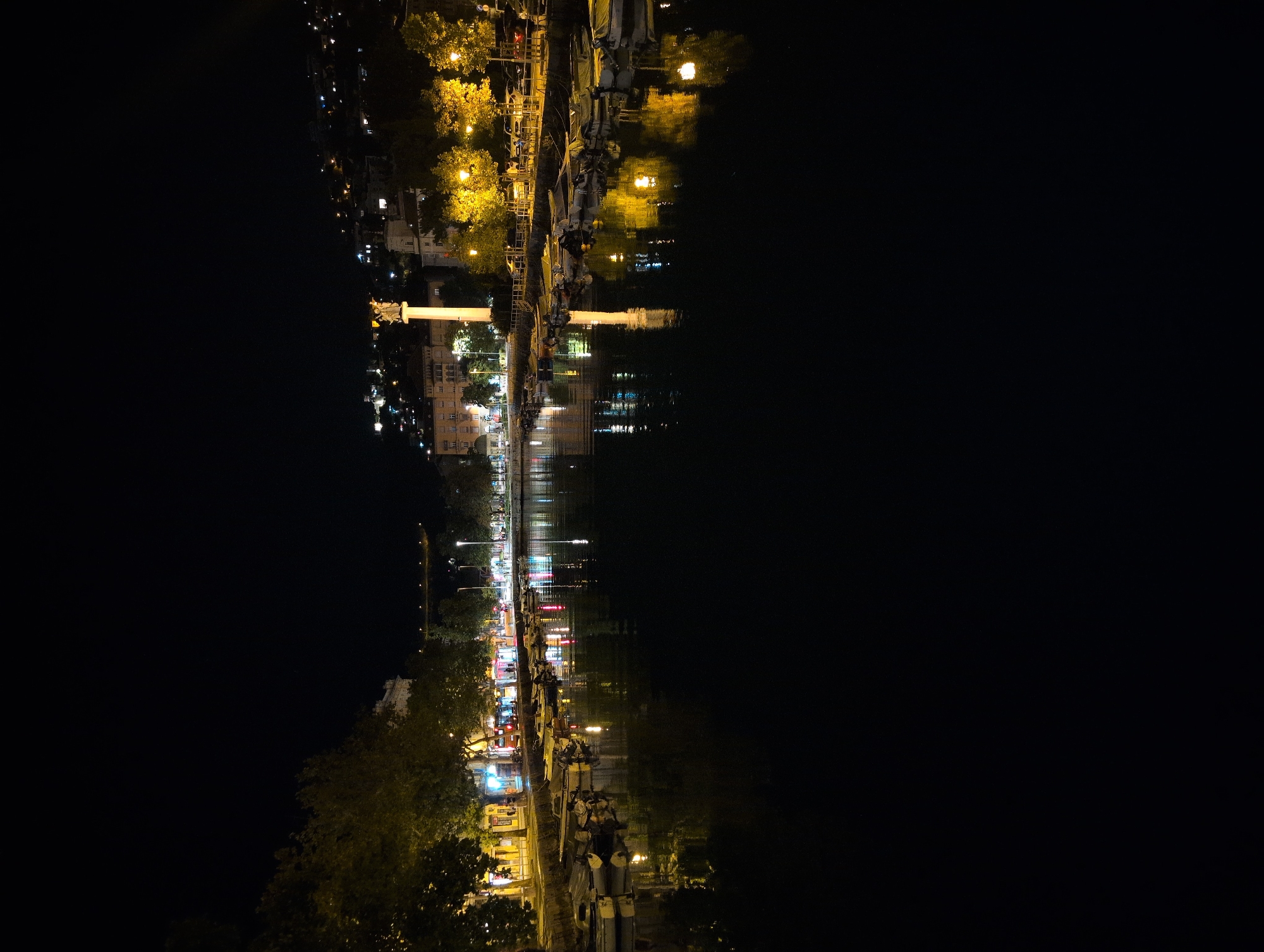 Rijeka harbor at night, boats moored along the waterfront