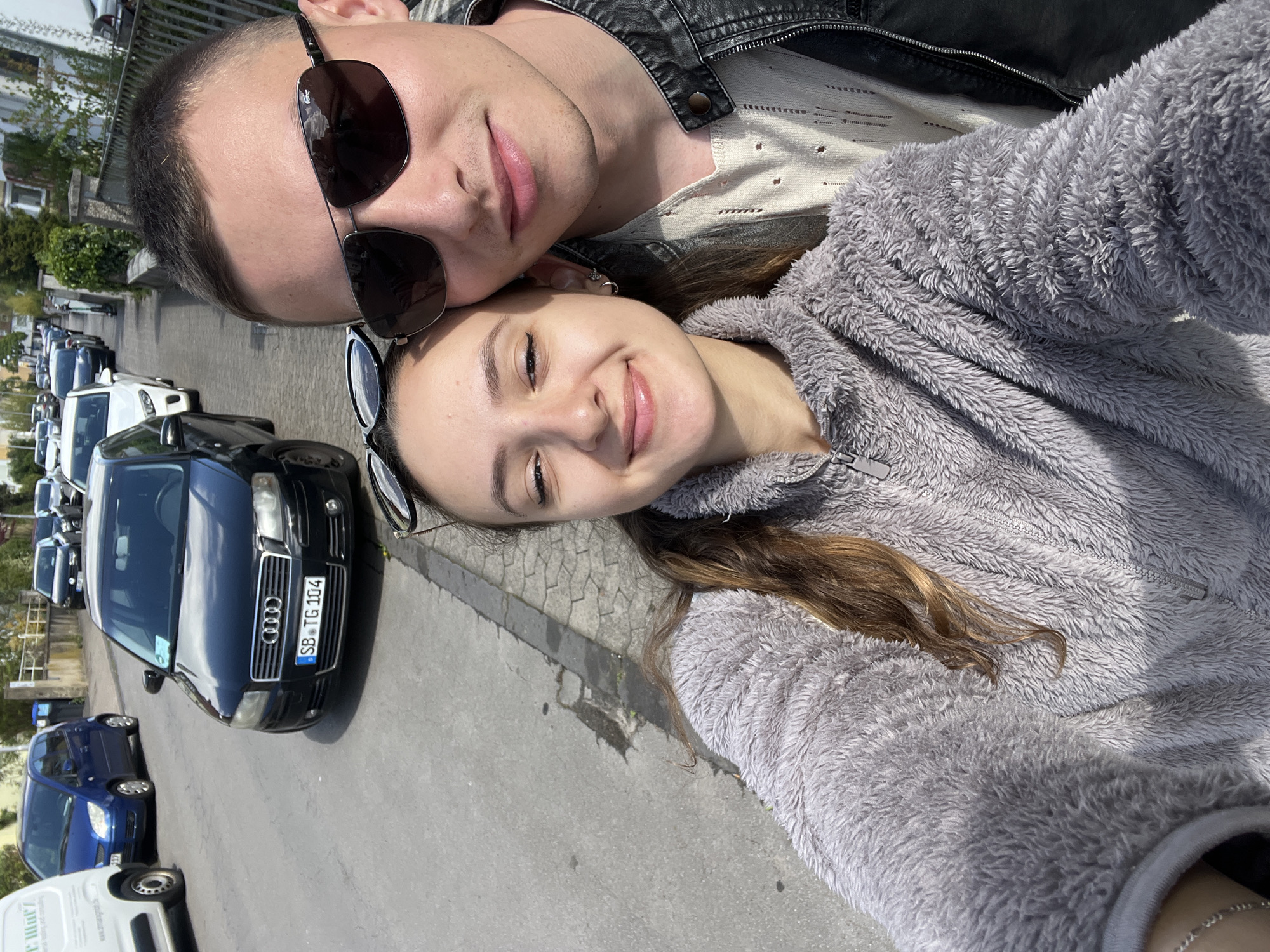 Couple takes selfie on residential street in Saarbrücken