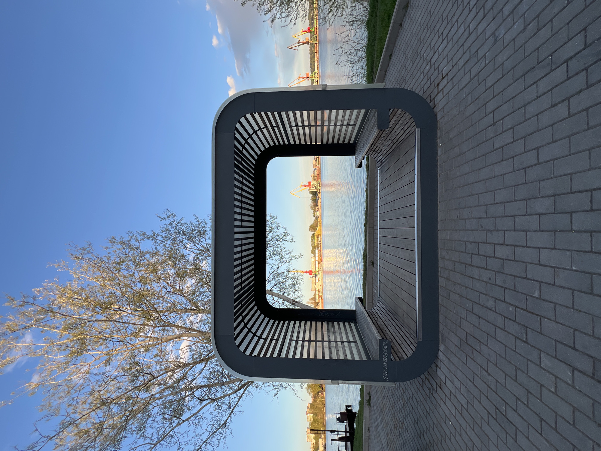 Spring evening life documented across Cherepovets waterfront and streets