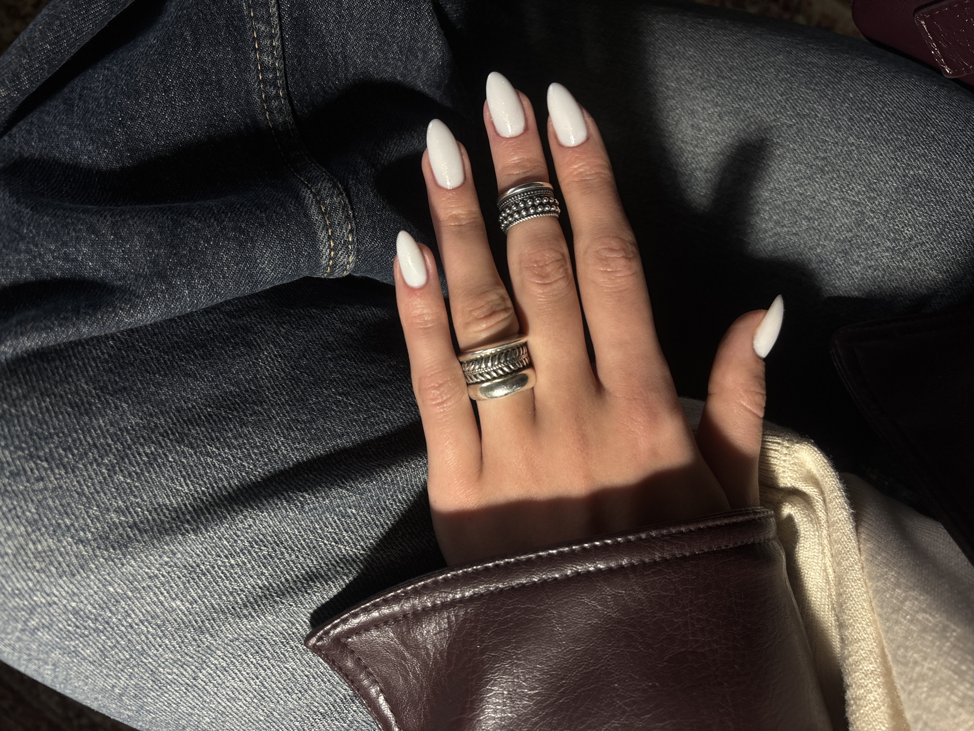 Person with white manicured nails photographed in Yerevan