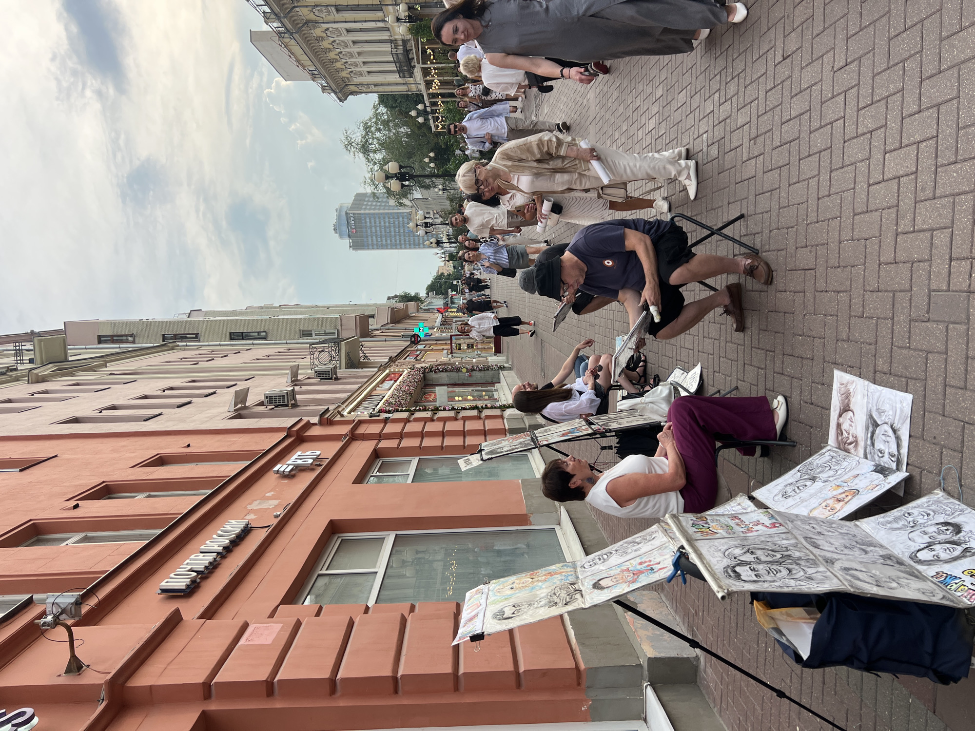 Moscow street life unfolds around art installations and performers