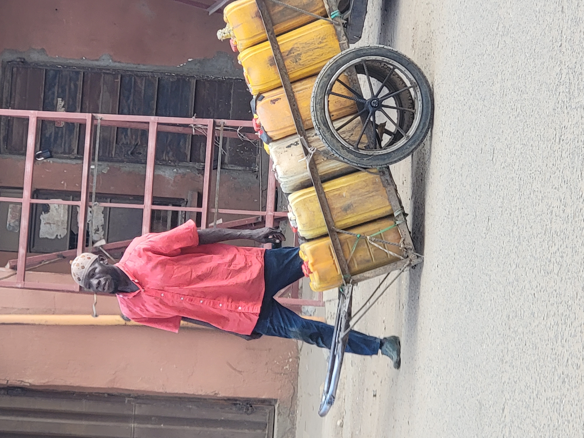 Daily life unfolds on Maiburiji streets
