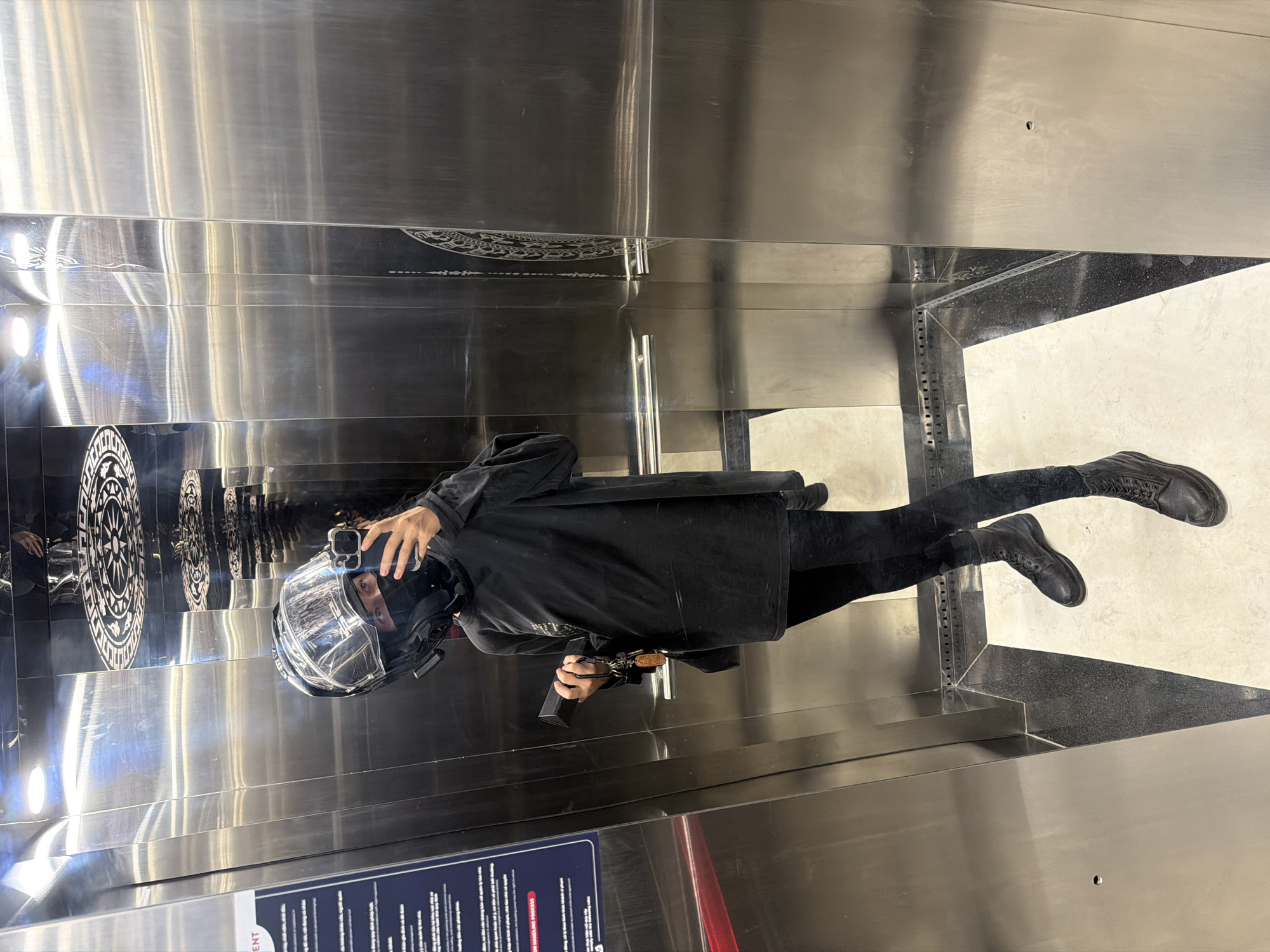 Motorcyclist takes elevator selfie in Đà Nẵng, Vietnam