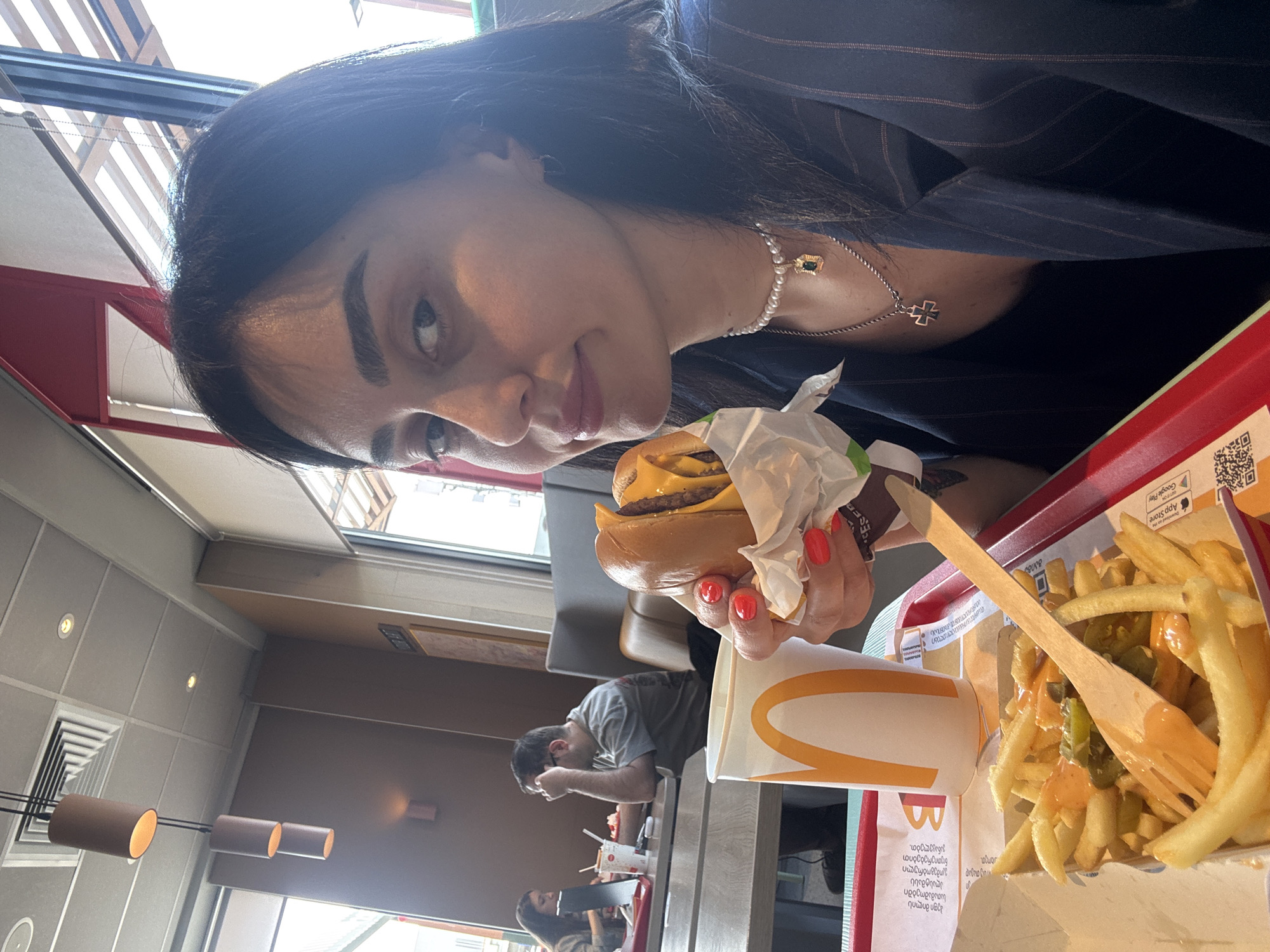 Woman photographs McDonald's visit in Tbilisi, Georgia