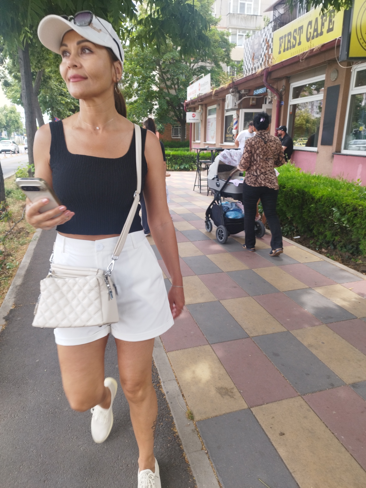 Morning street activity along a main road in Constanța, Romania