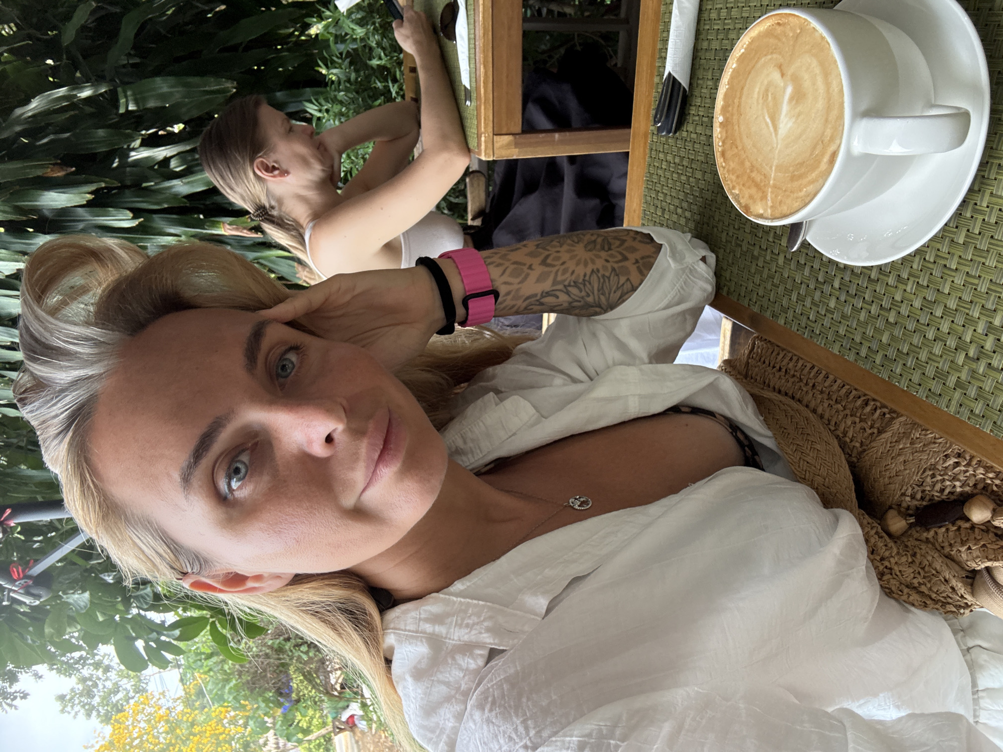Coffee and tropical greenery at a Ko Samui outdoor café