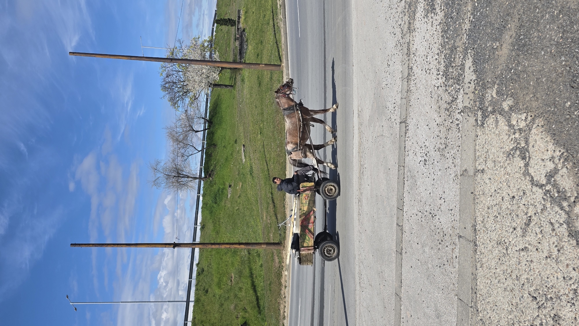 Horse cart and cloudy skies observed in Blagoevgrad streets