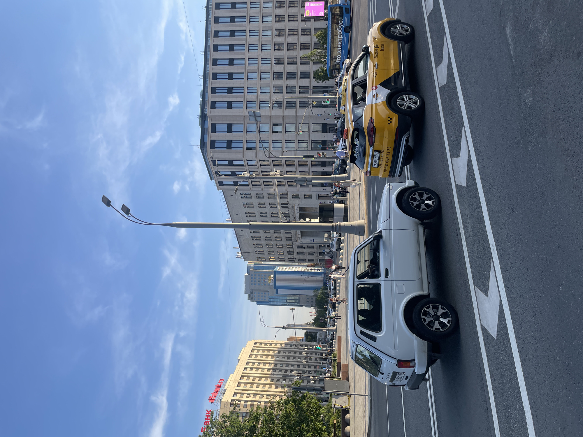 Moscow street scenes show parked cars and church architecture